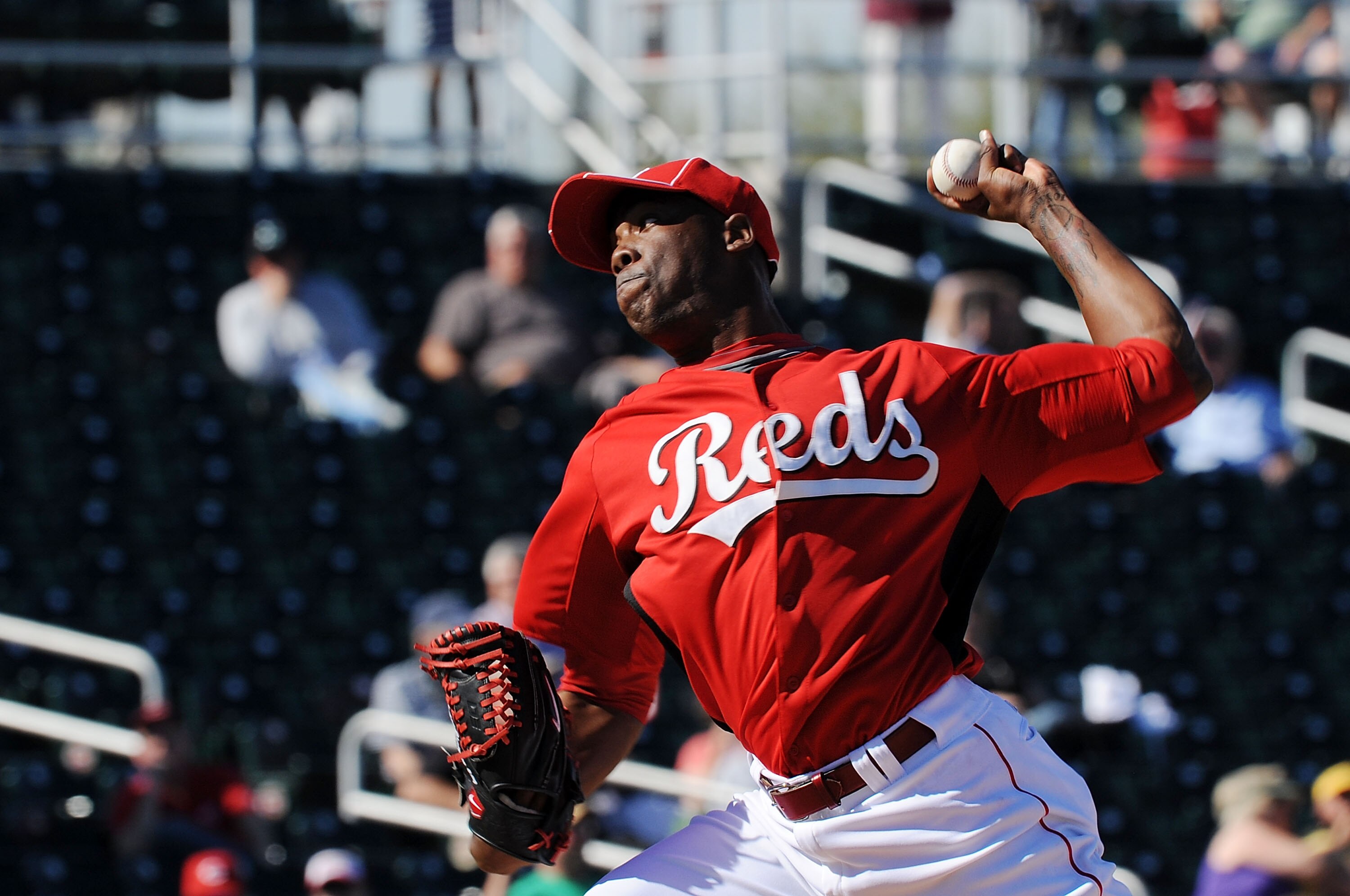 GOODYEAR, AZ - FEBRUARY 28:  Aroldis Chapman #54 of the Cincinnati Reds delivers a pitch against the Cleveland Indians at Goodyear Ballpark on February 28, 2011 in Goodyear, Arizona.  (Photo by Norm Hall/Getty Images)