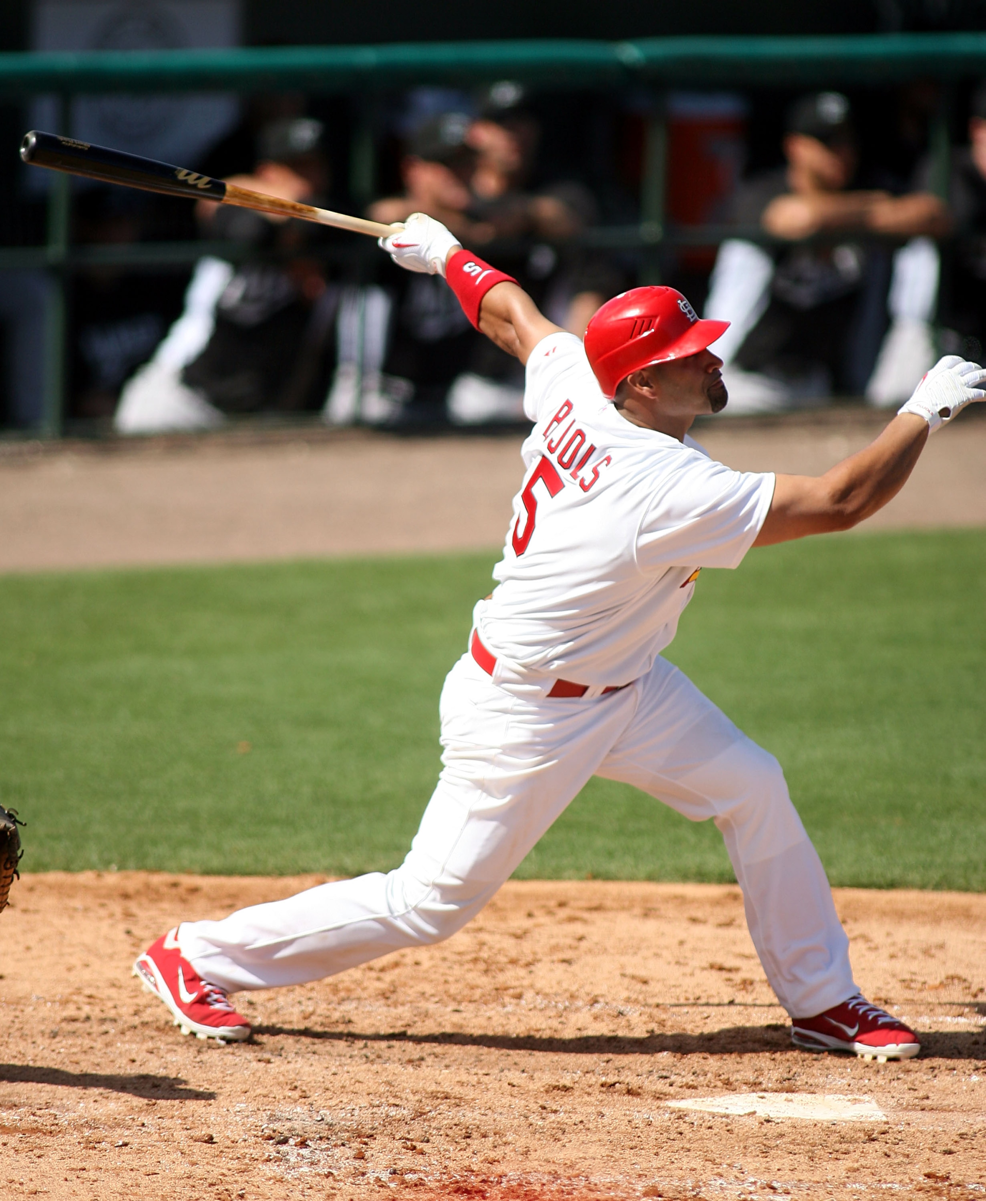 JUPITER, FL - FEBRUARY 28:  Albert Pujols #5 of the St. Louis Cardinals bats against the Florida Marlins at Roger Dean Stadium on February 28, 2011 in Jupiter, Florida.  (Photo by Marc Serota/Getty Images)