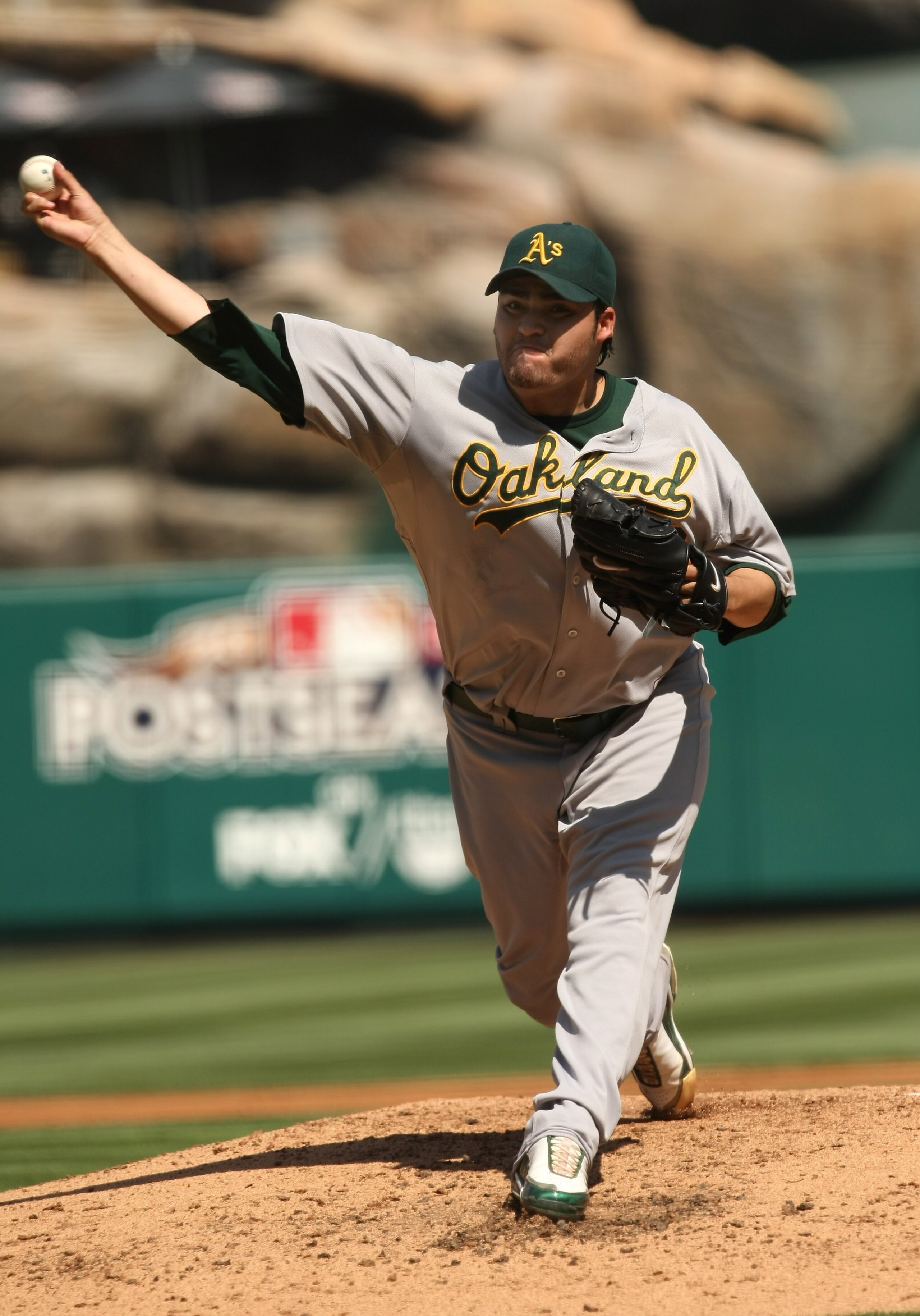 ANAHEIM, CA - SEPTEMBER 27:  Pitcher Edgar Gonzalez #59 of the Oakland Athletics throws a pitch against the Los Angeles Angels of Anaheim on September 27, 2009 at Angel Stadium in Anaheim, California.   The Angels won 7-4.  (Photo by Stephen Dunn/Getty Im