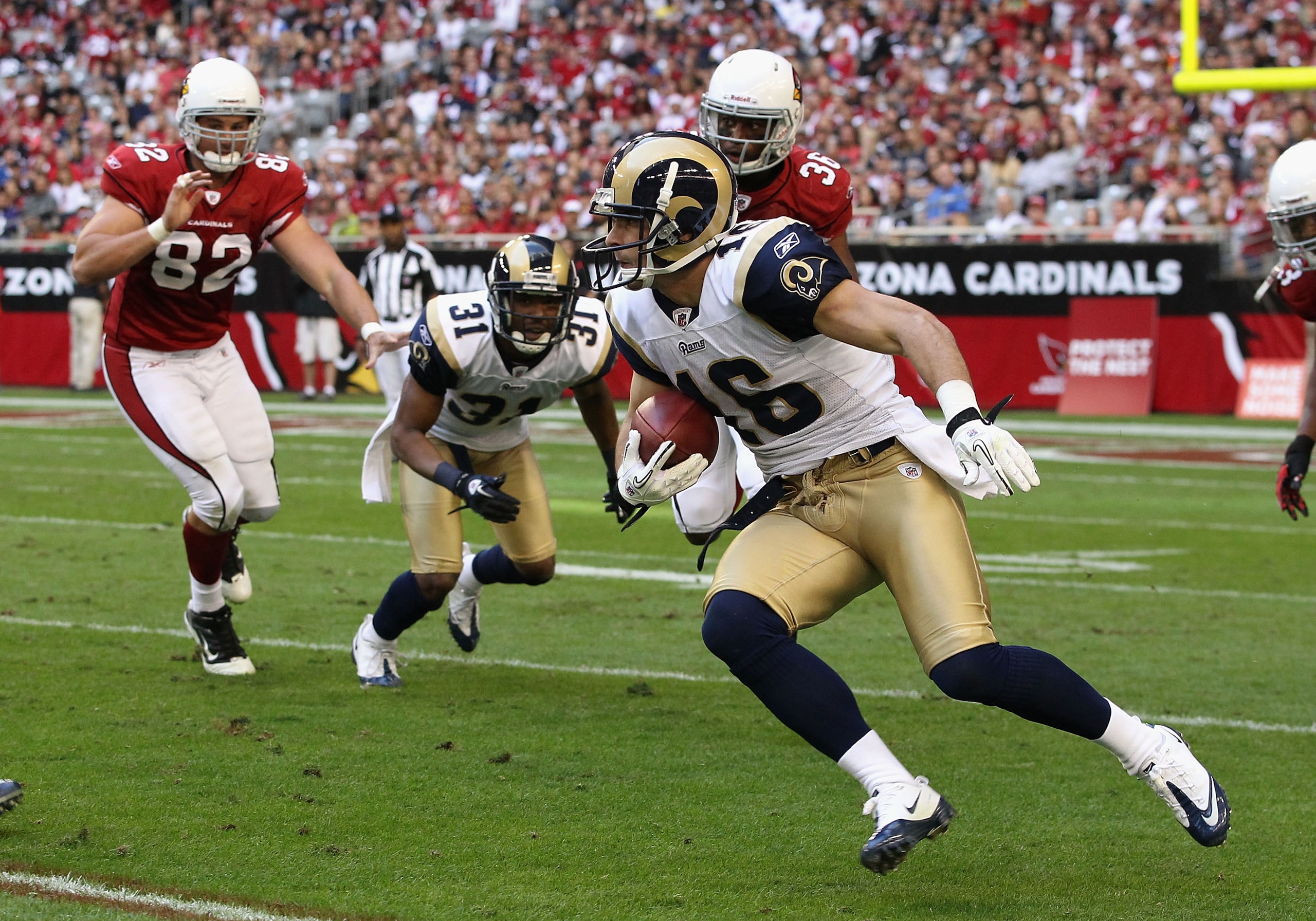 GLENDALE, AZ - DECEMBER 05:  Wide receiver Danny Amendola #16 of the St. Louis Rams runs with the football during the NFL game against the Arizona Cardinals at the University of Phoenix Stadium on December 5, 2010 in Glendale, Arizona. The Rams defeated t