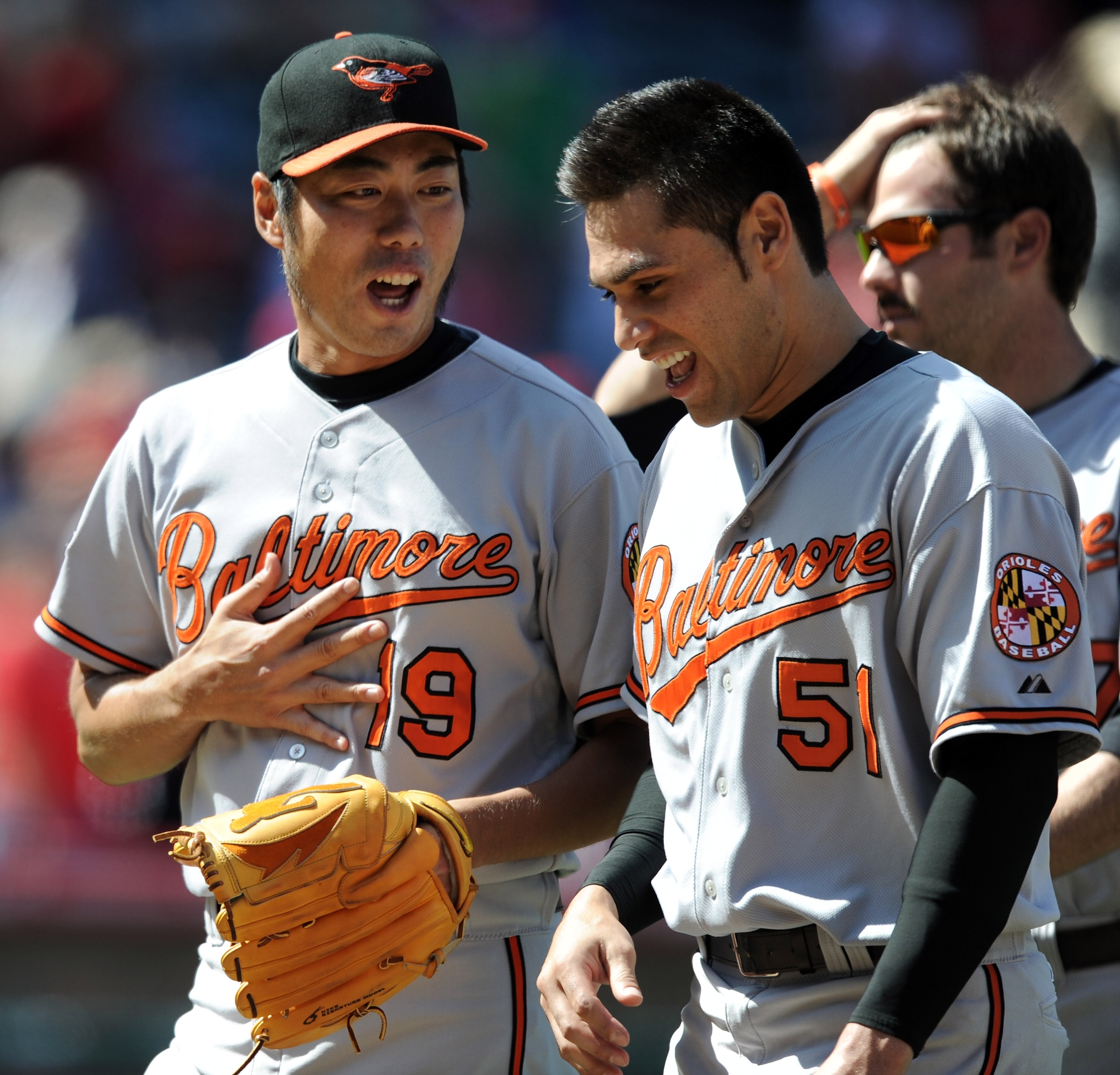 ANAHEIM, CA - AUGUST 29: Koji Uehara #19 of the Baltimore Orioles celebrates a save and a 1-0 win with Michael Gonzalez #51 over the Los Angeles Angels of Anaheim during the ninth inning at Angel Stadium on August 29, 2010 in Anaheim, California. (Photo ANAHEIM, CA - AUGUST 29: Koji Uehara #19 of the Baltimore Orioles celebrates a save and a 1-0 win with Michael Gonzalez #51 over the Los Angeles Angels of Anaheim during the ninth inning at Angel Stadium on August 29, 2010 in Anaheim, California. (Photo