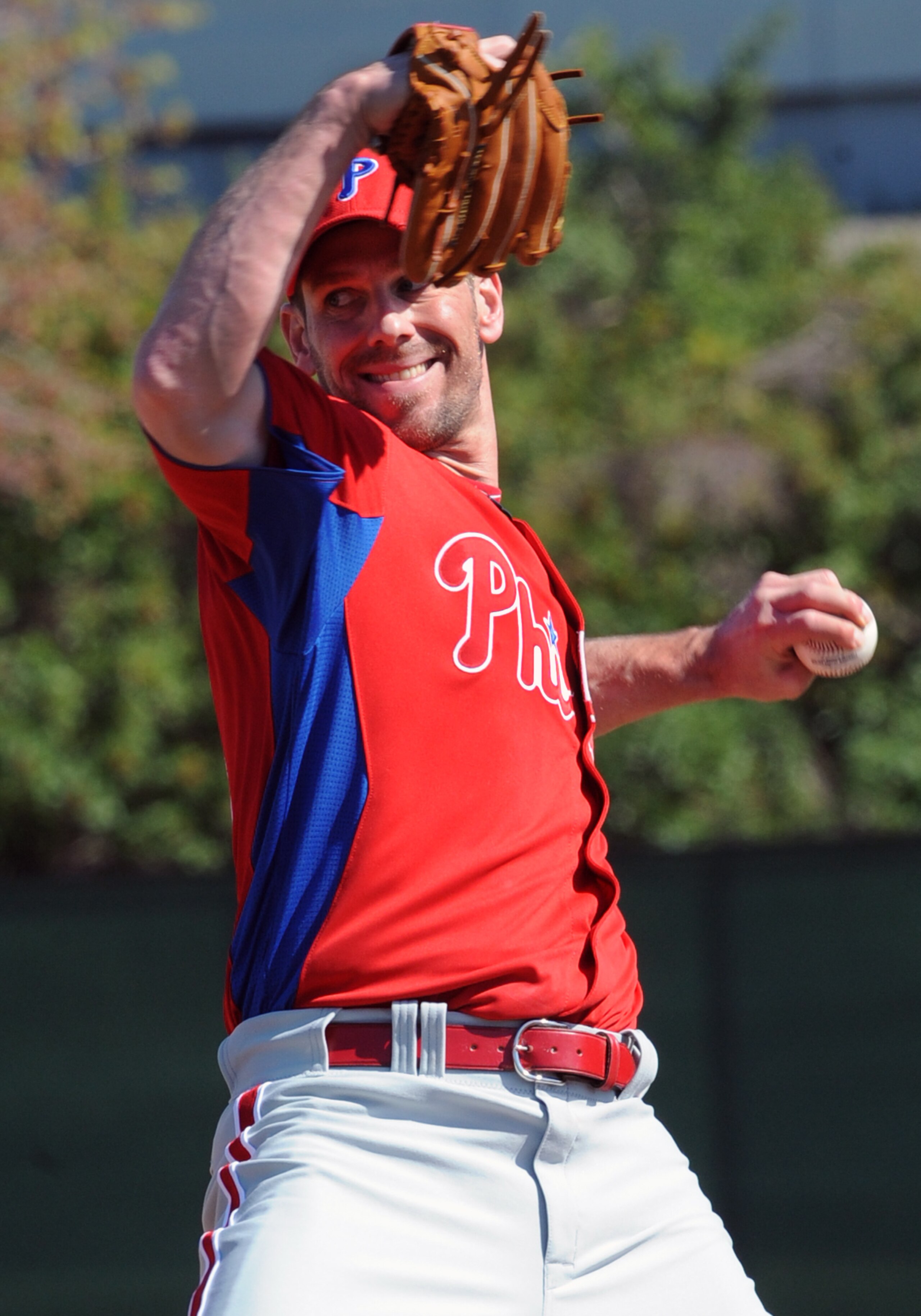 CLEARWATER, FL - FEBRUARY 19: Pitcher Cliff Lee #33 of the Philadelphia Phillies throws from the mound during a spring training workout February 19, 2011 the Carpenter Complex at Bright House Field in Clearwater, Florida. (Photo by Al Messerschmidt/Getty