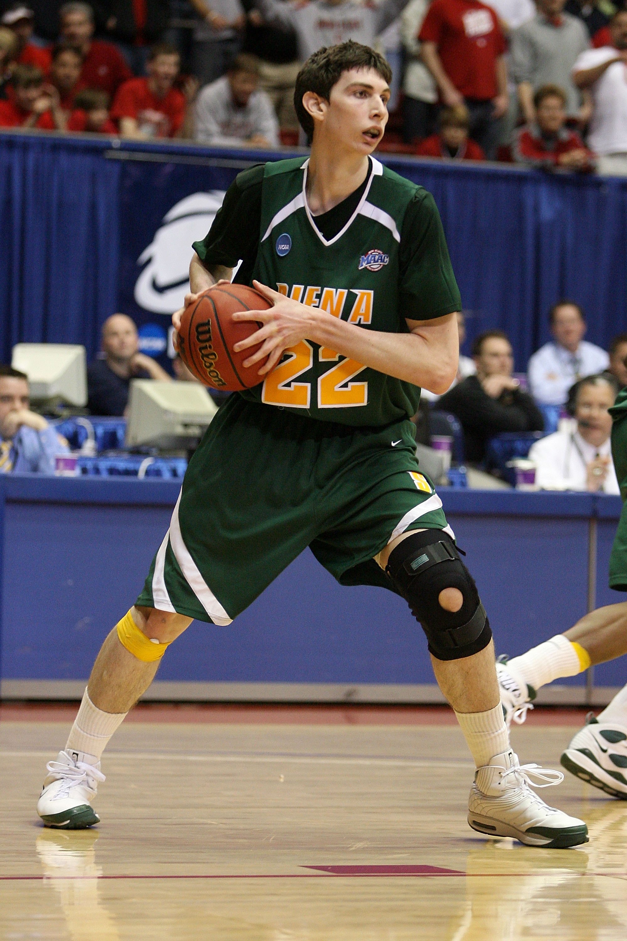 DAYTON, OH - MARCH 20: Ryan Rossiter #22 of the Siena Saints handles the ball against the Ohio State Buckeyes during the first round of the NCAA Division I Men's Basketball Tournament at the University of Dayton Arena on March 20, 2009 in Dayton, Ohio. (