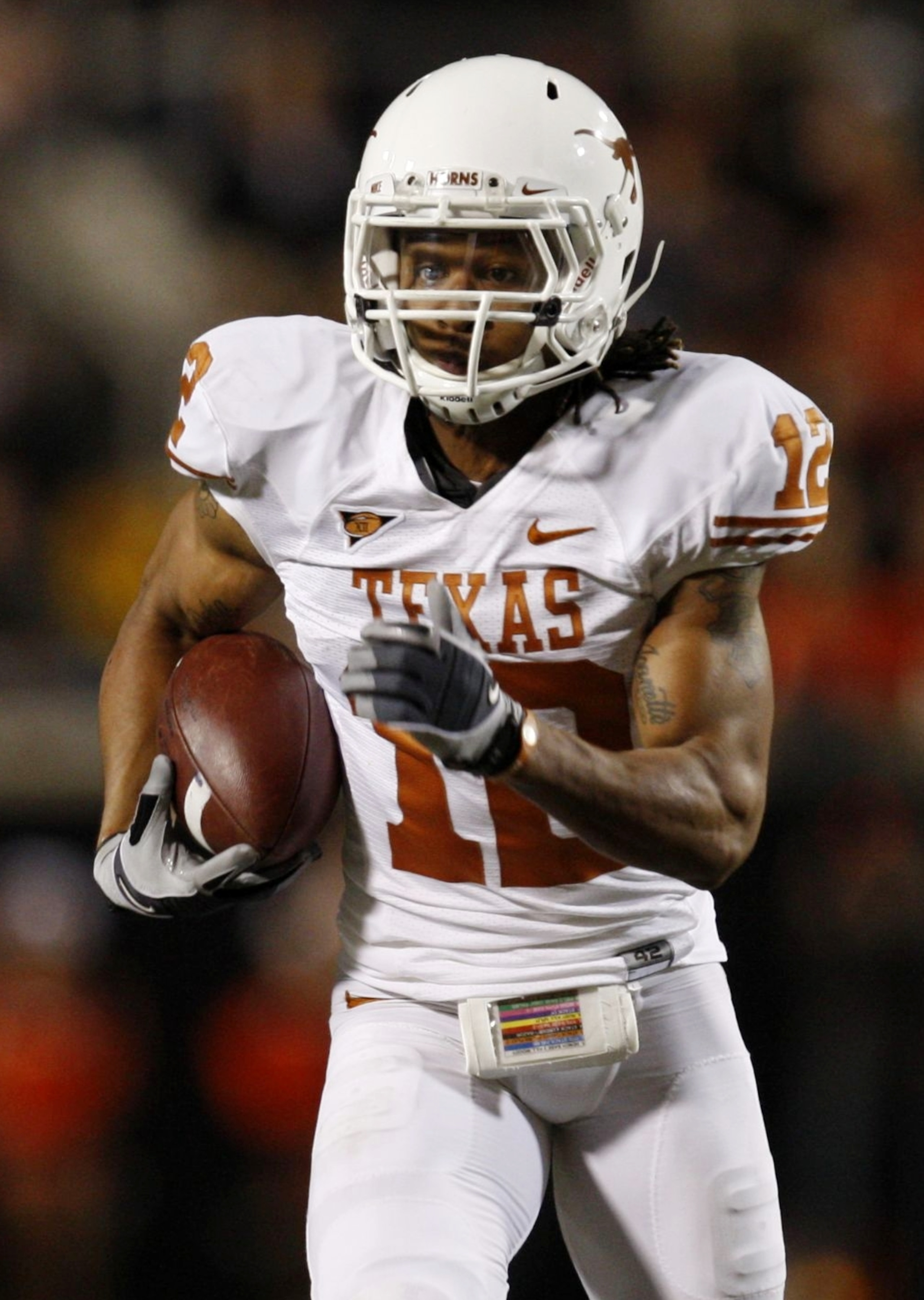STILLWATER, OK - OCTOBER 31: Earl Thomas #12 of the Texas Longhorns runs with the ball after an interception for a touchdown in the third quarter against the Oklahoma State Cowboys at Boone Pickens Stadium on October 31, 2009 in Stillwater, Oklahoma. (Pho