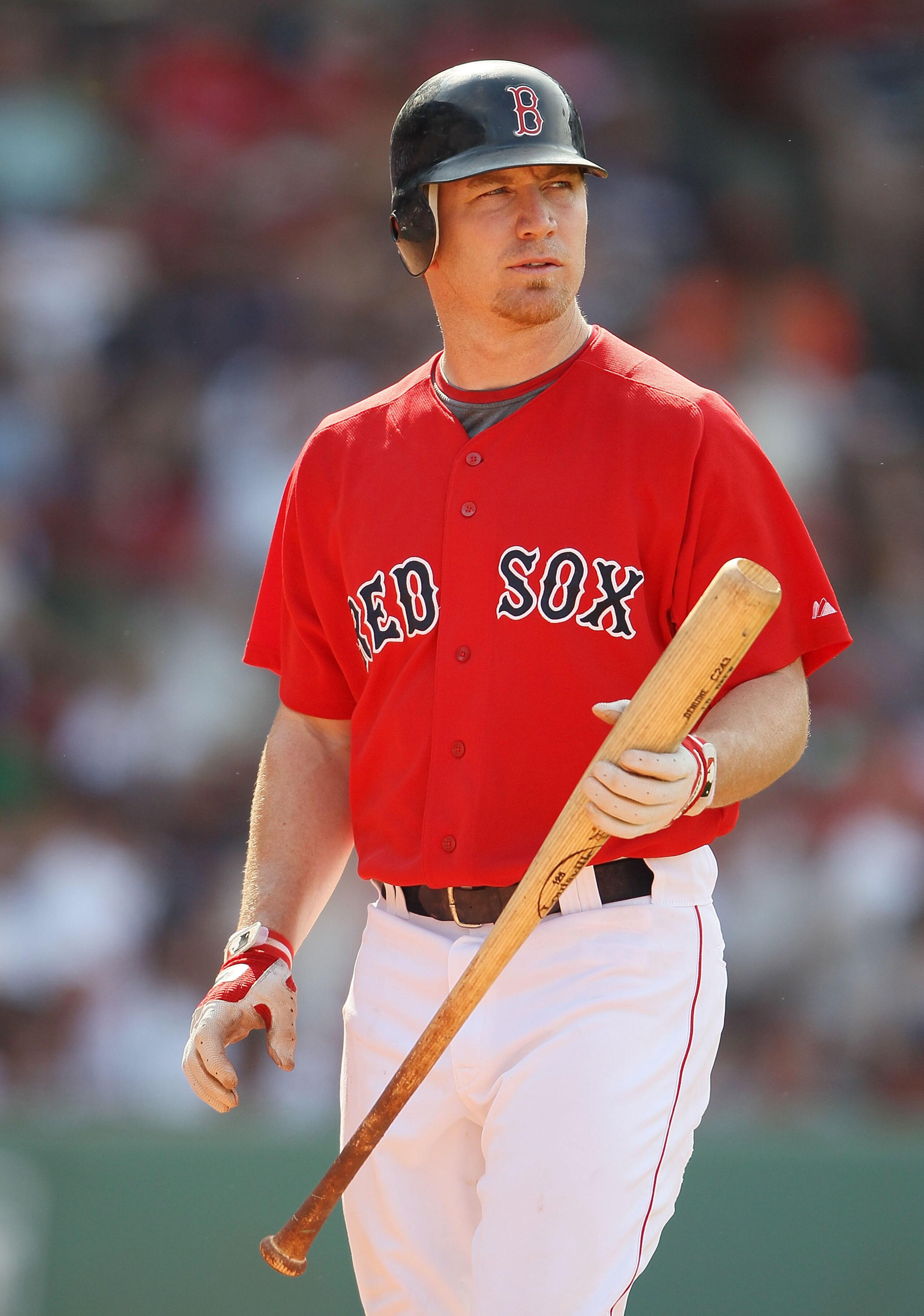 BOSTON - JULY 04:  J.D. Drew #7 of the Boston Red Sox heads back to the dugout after striking out against the Baltimore Orioles on July 4, 2010 at Fenway Park in Boston, Massachusetts. The Orioles defeated the Red Sox 6-1.  (Photo by Elsa/Getty Images)