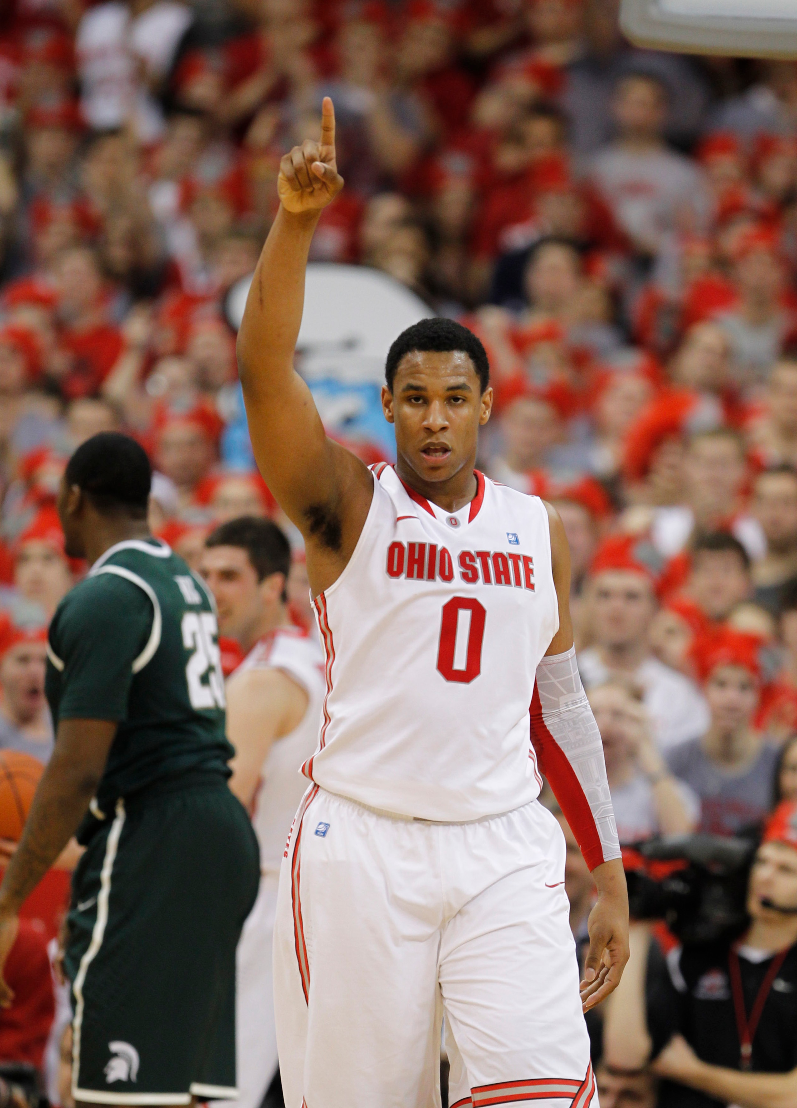 COLUMBUS, OH - FEBRUARY 15:  Jared Sullinger #0 of the Ohio State Buckeyes reacts while playing the Michigan State Spartans on February 15, 2011 at Value City Arena in Columbus, Ohio.  (Photo by Gregory Shamus/Getty Images)
