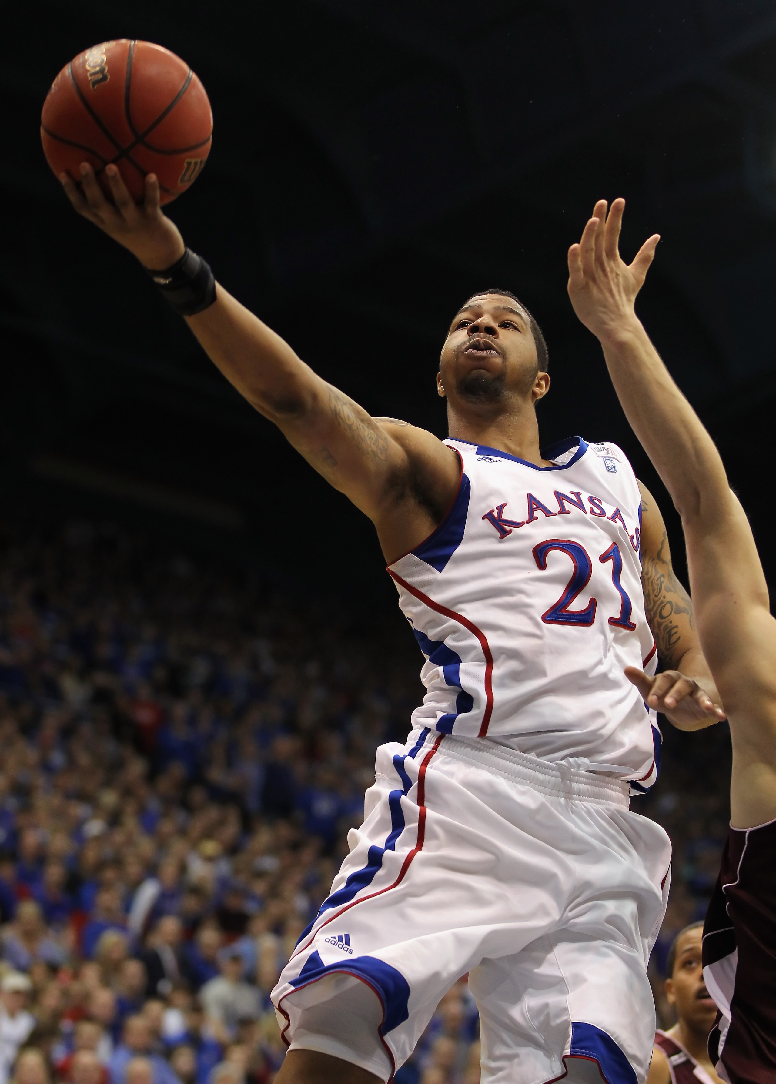 LAWRENCE, KS - MARCH 02:  Markieff Morris #21 of the Kansas Jayhawks shoots during the game against the Texas A&M Aggies on March 2, 2011 at Allen Fieldhouse in Lawrence, Kansas.  (Photo by Jamie Squire/Getty Images)