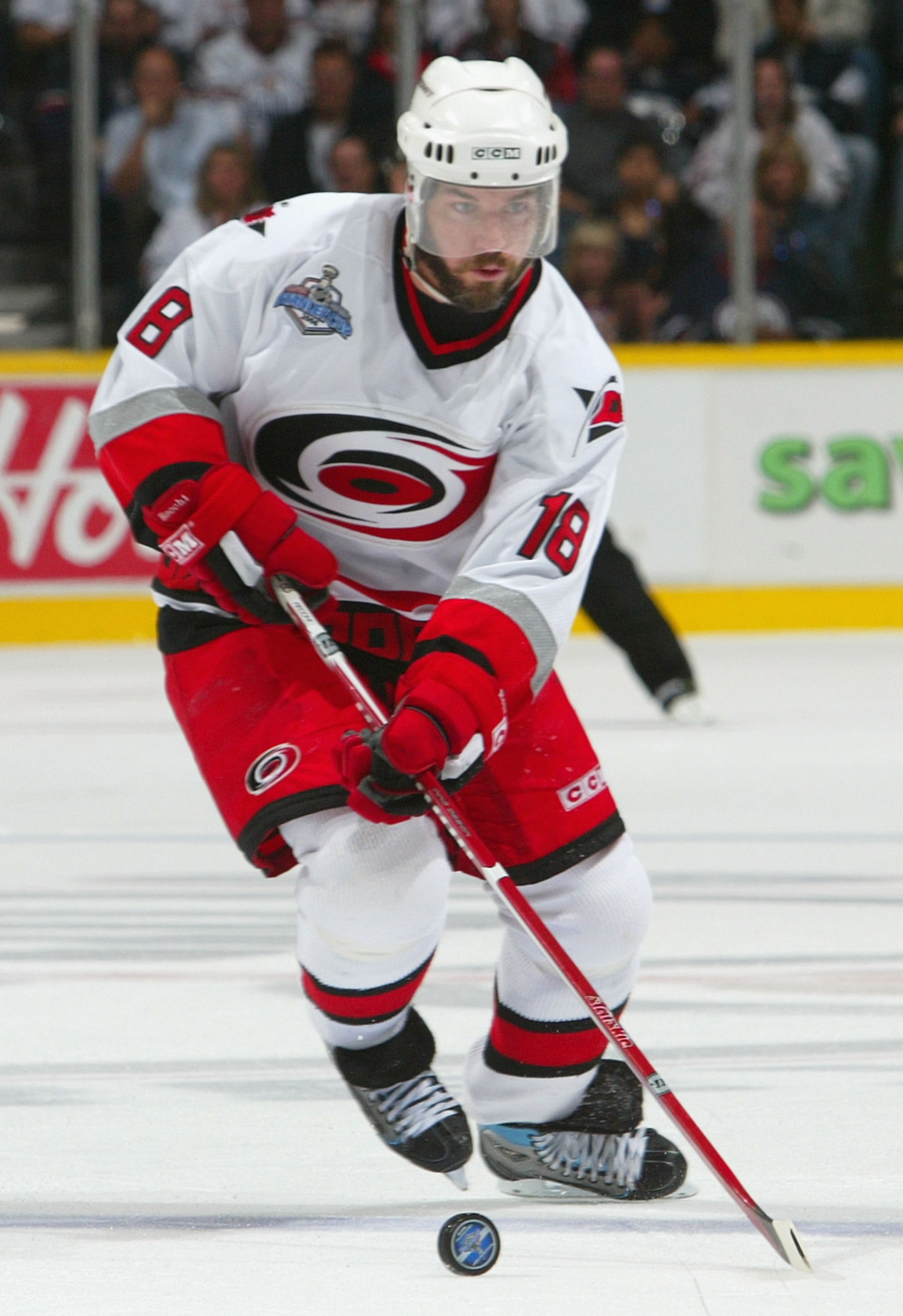 EDMONTON, AB - JUNE 17:  Mark Recchi #18 of the Carolina Hurricanes skates with the puck against the Edmonton Oilers during game six of the 2006 NHL Stanley Cup Finals on June 17, 2006 at Rexall Place in Edmonton, Alberta, Canada.  The Oilers defeated the