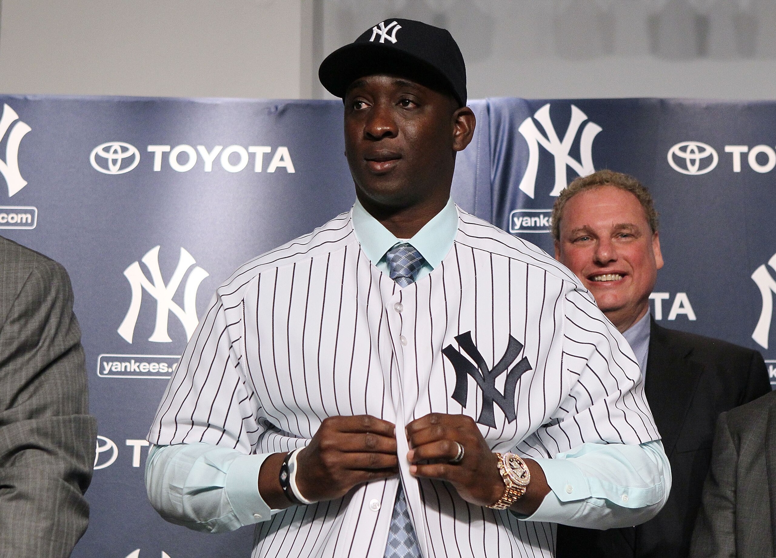 NEW YORK, NY - JANUARY 19:  Rafael Soriano of the New York Yankees tries on his new uniform during his introduction press conference on January 19, 2011 at Yankee Stadium in the Bronx borough of New York City. The Yankees signed Soriano to a three-year co