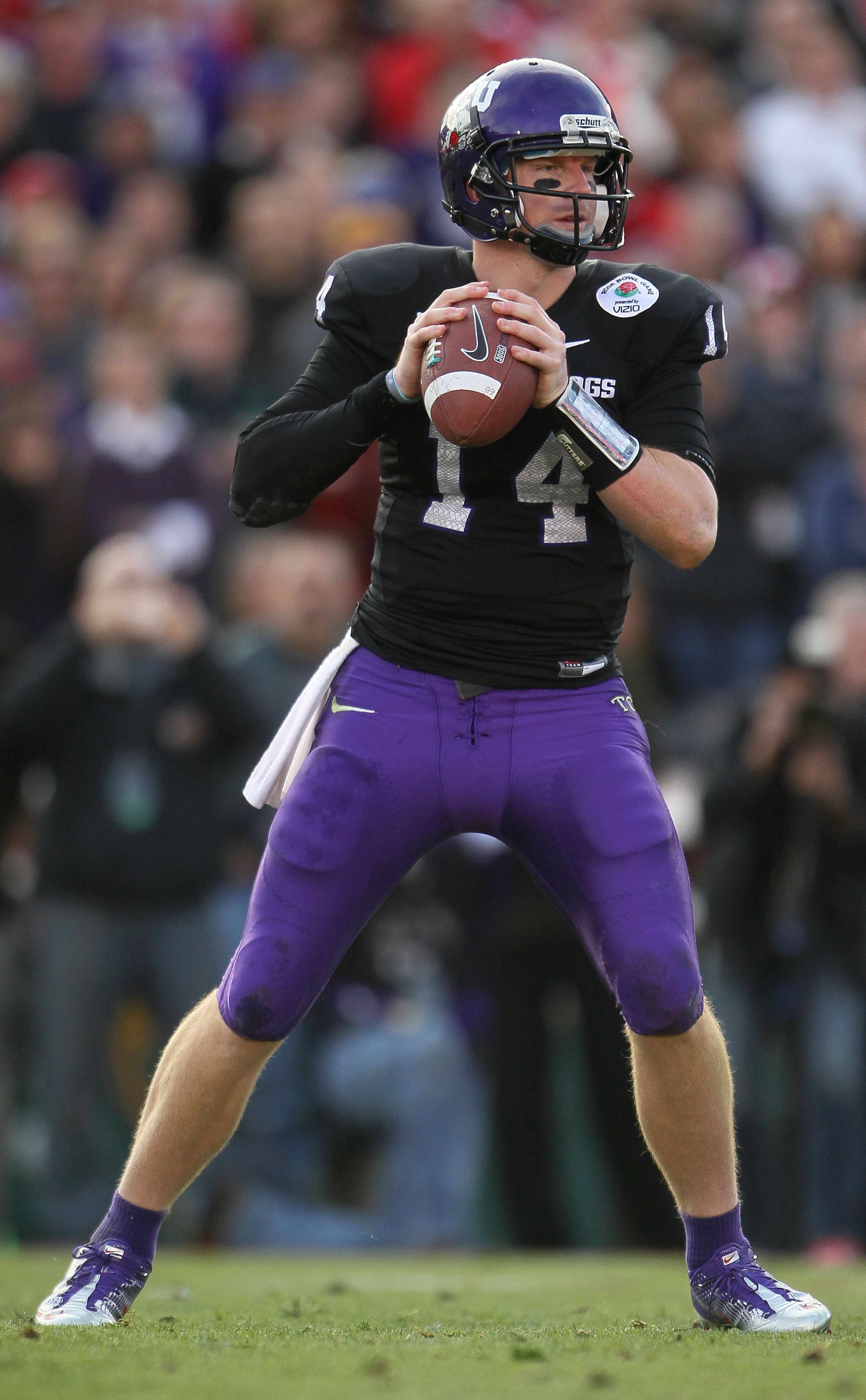 PASADENA, CA - JANUARY 01:  Quarterback Andy Dalton #14 of the TCU Horned Frogs looks to pass against the Wisconsin Badgers in the 97th Rose Bowl game on January 1, 2011 in Pasadena, California.  (Photo by Jeff Gross/Getty Images)