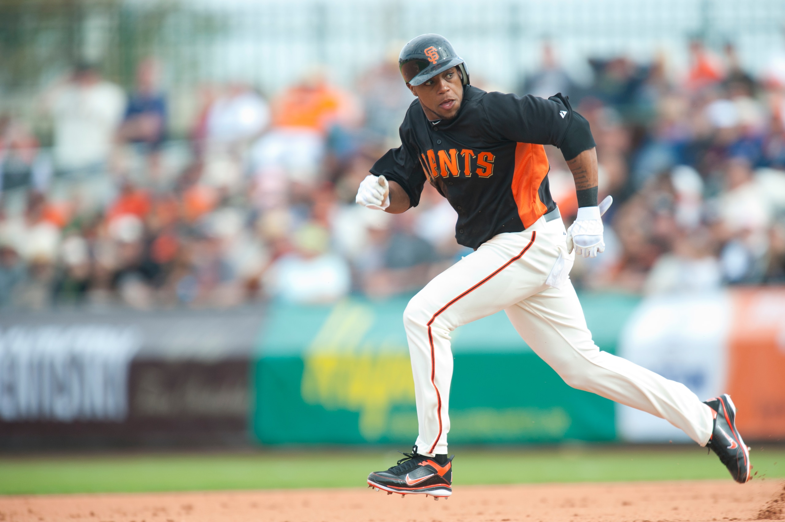 SCOTTSDALE, AZ - FEBRUARY 25: Darren Ford #34 of the San Francisco Giants attempts to steal second base during a spring training game against the Arizona Diamondbacks at Scottsdale Stadium on February 25, 2011 in Scottsdale, Arizona. (Photo by Rob Tringal