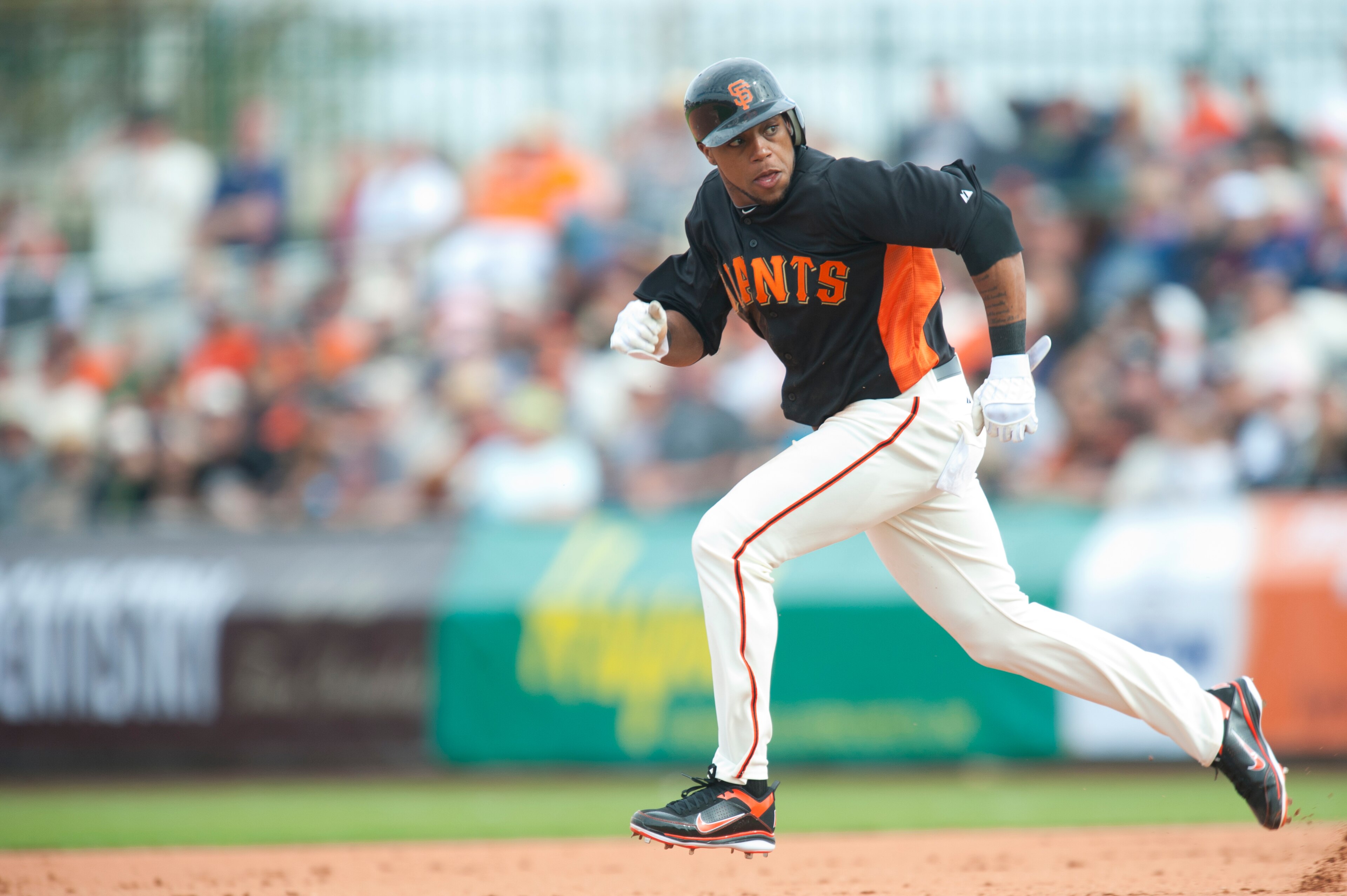 SCOTTSDALE, AZ - FEBRUARY 25: Darren Ford #34 of the San Francisco Giants attempts to steal second base during a spring training game against the Arizona Diamondbacks at Scottsdale Stadium on February 25, 2011 in Scottsdale, Arizona. (Photo by Rob Tringal