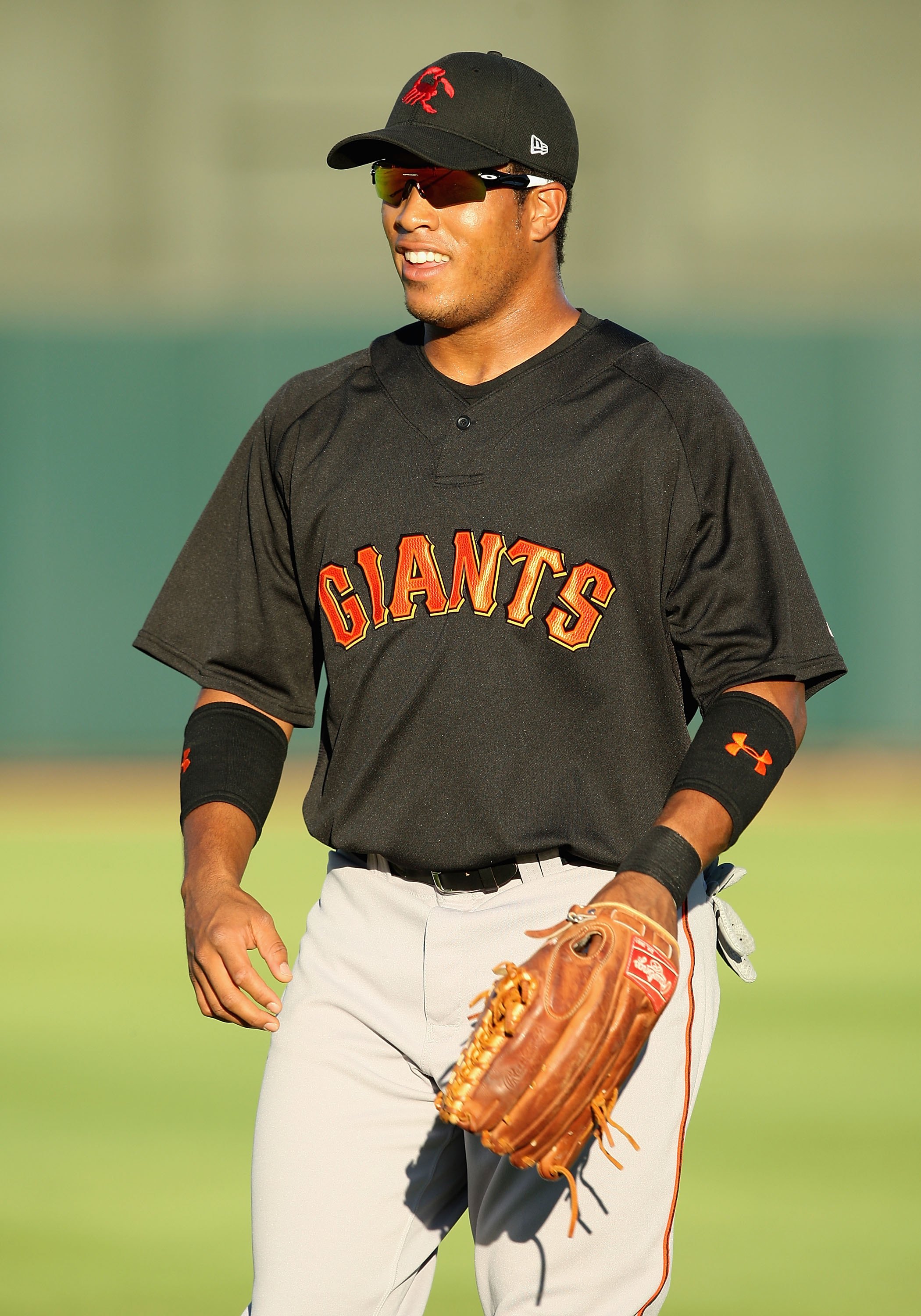 PHOENIX - OCTOBER 16:  San Francisco Giants prospect Thomas Neal, playing for the Scottsdale Scorpions, warms up before the Arizona Fall League game against the Phoenix Desert Dogs at Phoenix Municipal Stadium on October 16, 2009 in Phoenix, Arizona  (Pho