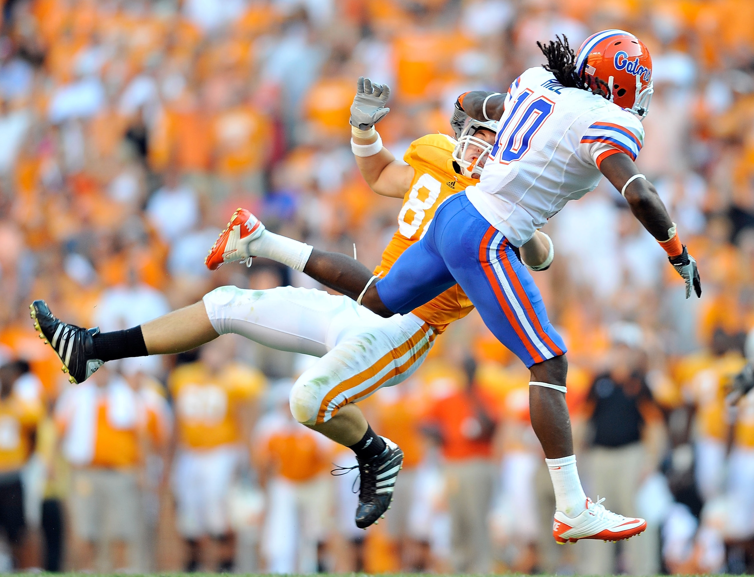 KNOXVILLE, TN - SEPTEMBER 18:  Will Hill #10 of the Florida Gators breaks up a pass intended for Zach Rogers #83 of the Tennessee Volunteers at Neyland Stadium on September 18, 2010 in Knoxville, Tennessee. Florida won 31-17.  (Photo by Grant Halverson/Ge