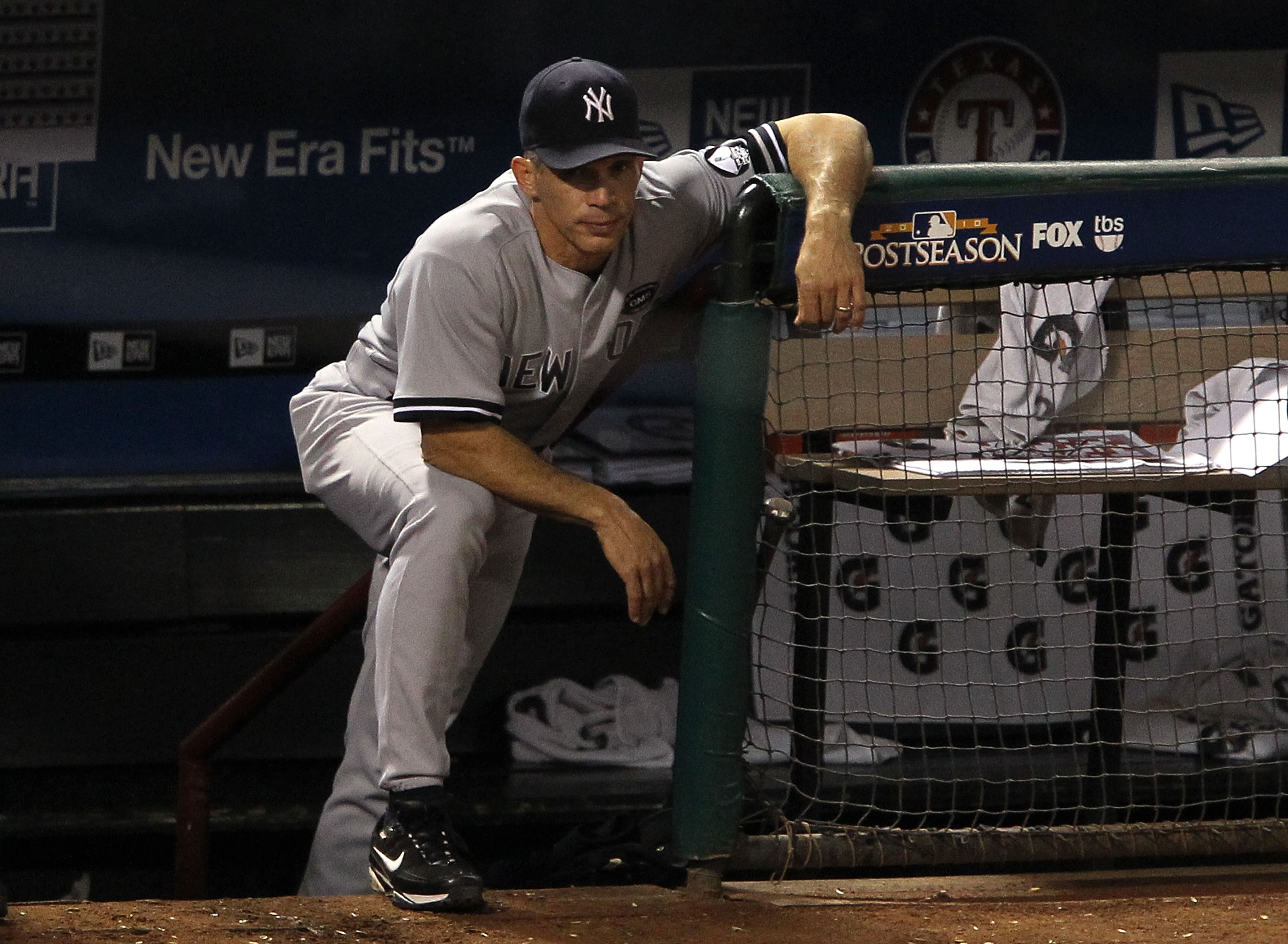 ARLINGTON, TX - OCTOBER 22:  Manager Joe Girardi of the New York Yankees looks on during Game Six of the ALCS against the Texas Rangers during the 2010 MLB Playoffs at Rangers Ballpark in Arlington on October 22, 2010 in Arlington, Texas.  (Photo by Ronal