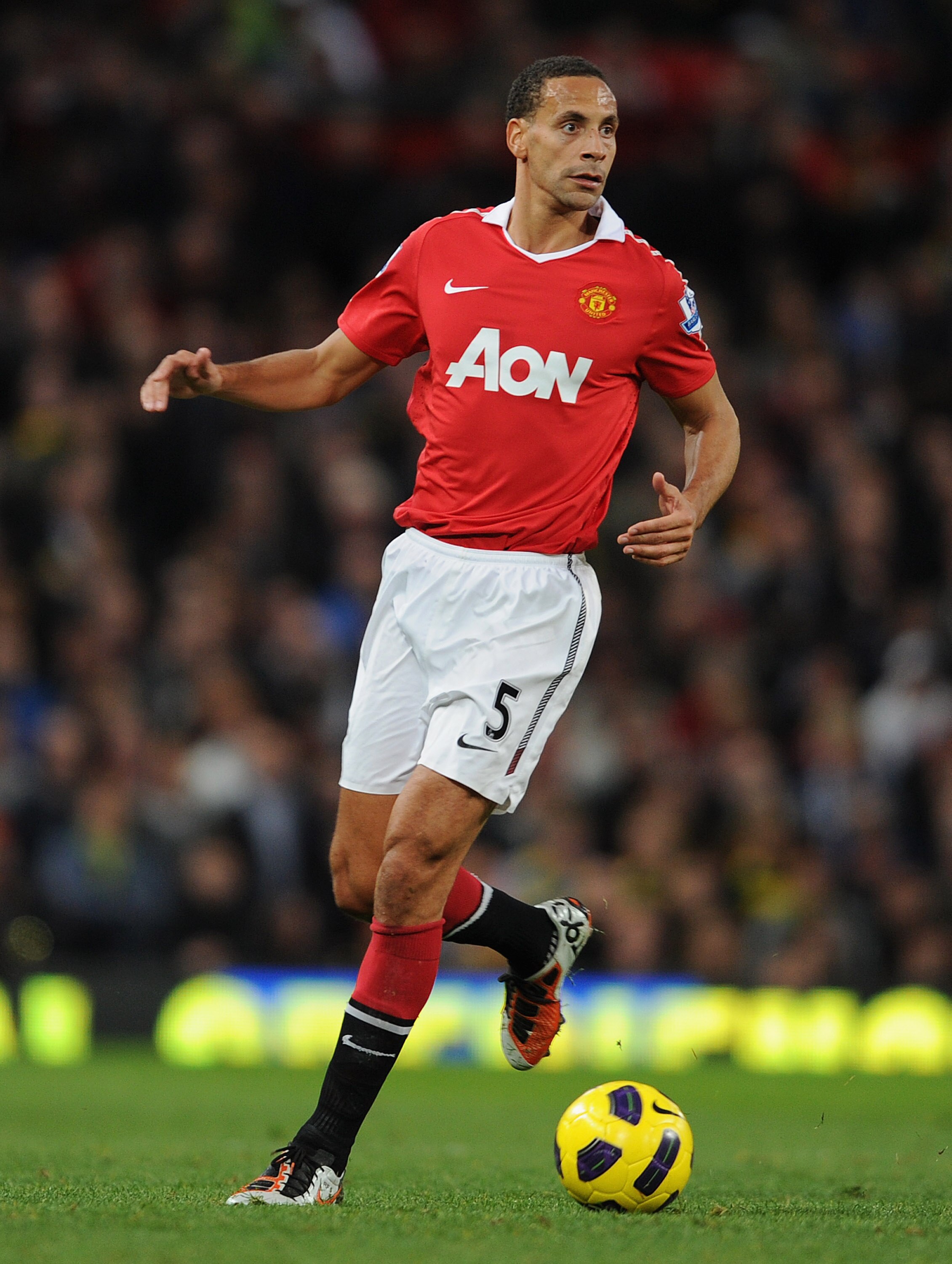 MANCHESTER, ENGLAND - OCTOBER 30:  Rio Ferdinand of Manchester United on the ball during the Barclays Premier League match between Manchester United and Tottenham Hotspur at Old Trafford on October 30, 2010 in Manchester, England.  (Photo by Michael Regan