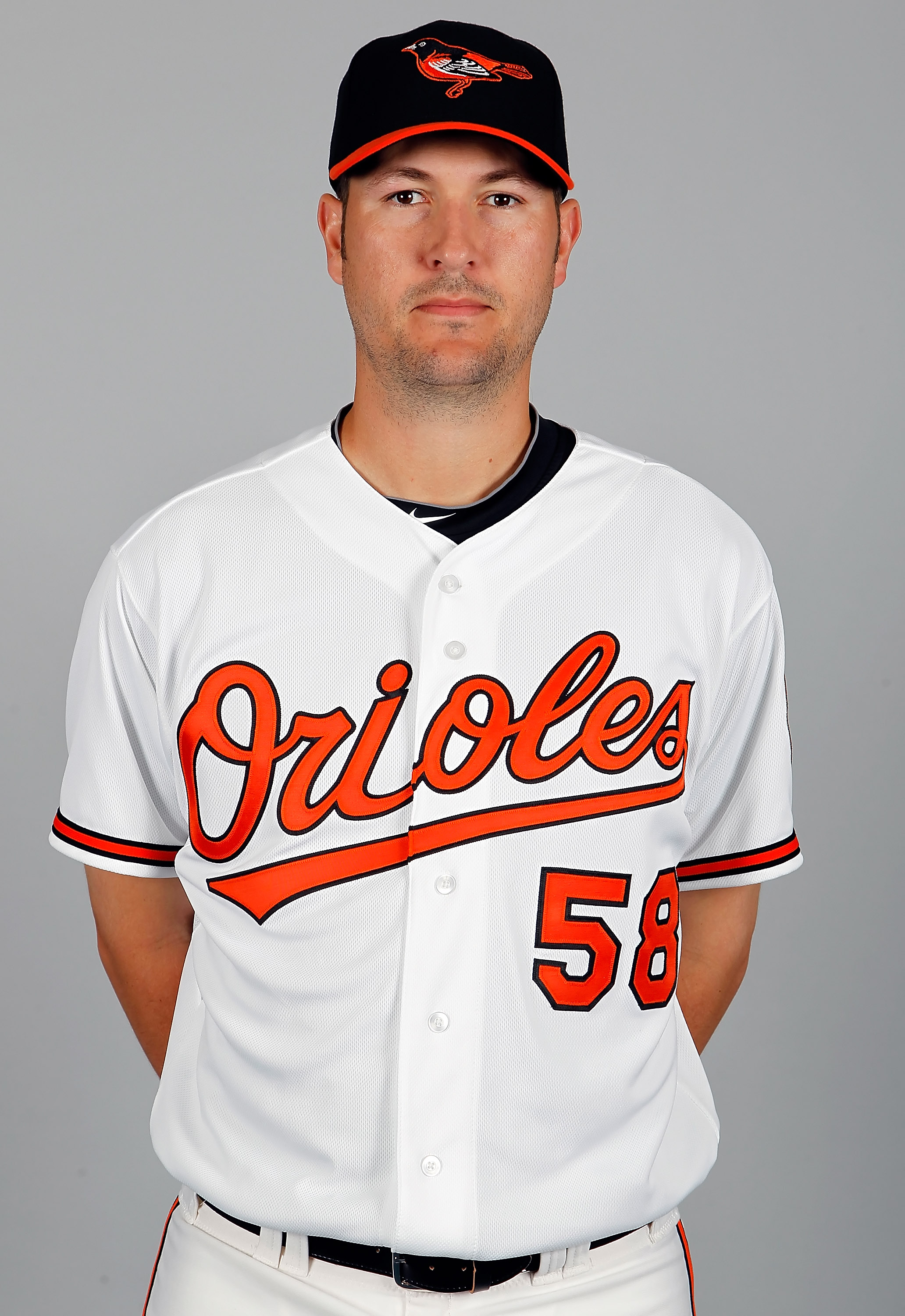 SARASOTA, FL - FEBRUARY 26:  Pitcher Justin Duchscherer #58 of the Baltimore Orioles poses for a photo during photo day at Ed Smith Stadium on February 26, 2011 in Sarasota, Florida.  (Photo by J. Meric/Getty Images)
