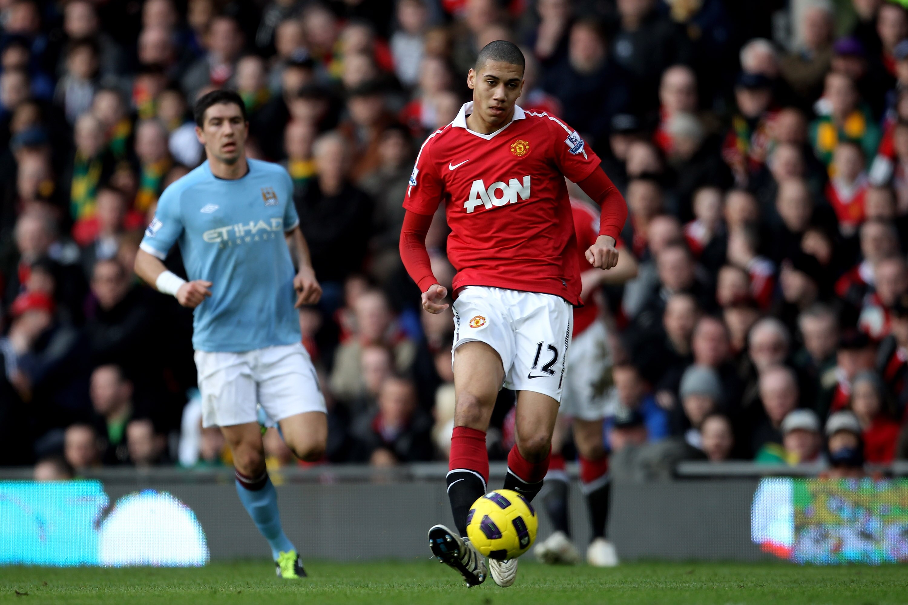 MANCHESTER, ENGLAND - FEBRUARY 12:  Chris Smalling of Manchester United in action during the Barclays Premier League match between Manchester United and Manchester City at Old Trafford on February 12, 2011 in Manchester, England.  (Photo by Alex Livesey/G