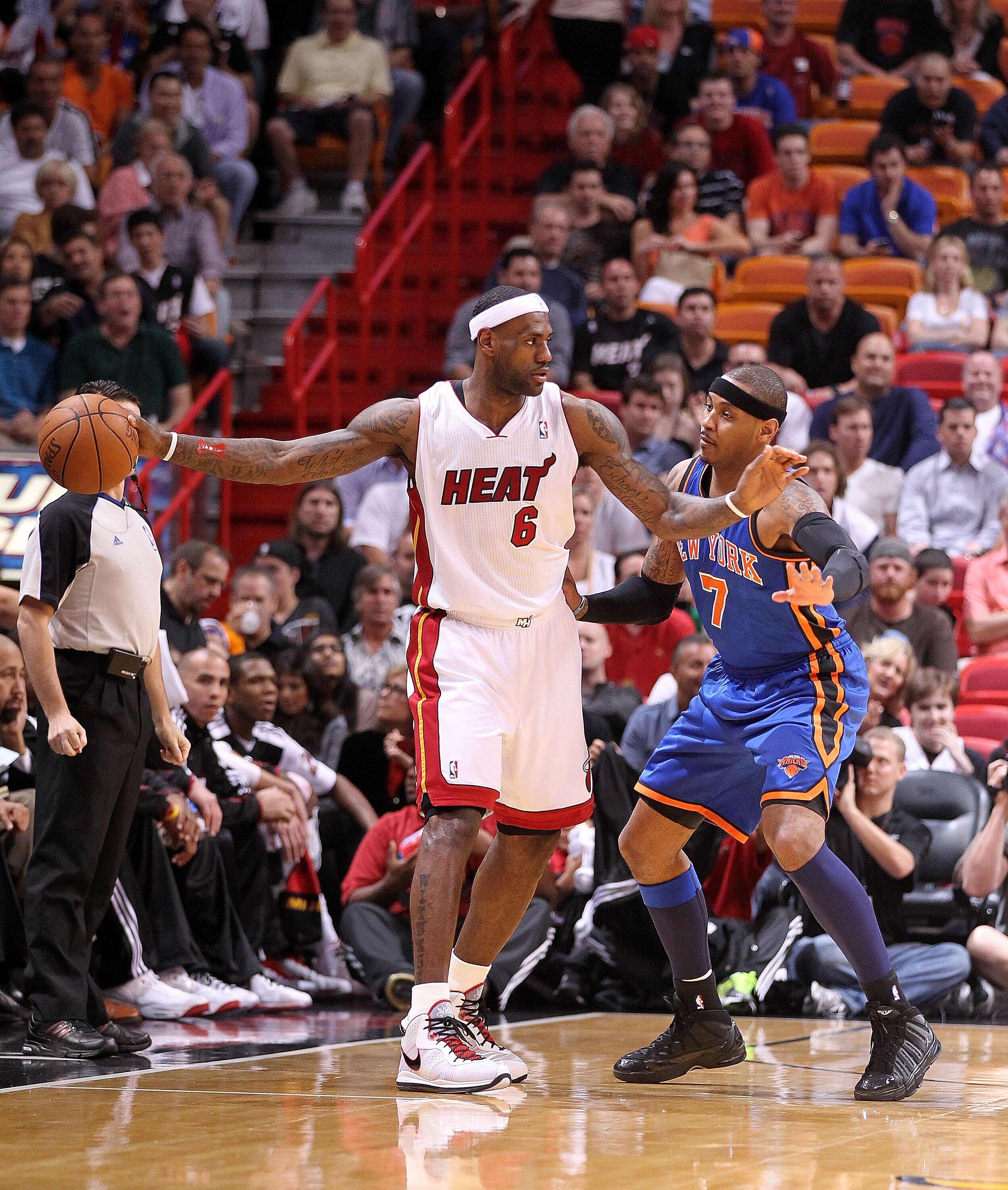 MIAMI, FL - FEBRUARY 27:  LeBron James #6 of the Miami Heat is guarded by Carmelo Anthony #7 of the New York Knicks looks on during a game at American Airlines Arena on February 27, 2011 in Miami, Florida. NOTE TO USER: User expressly acknowledges and agr