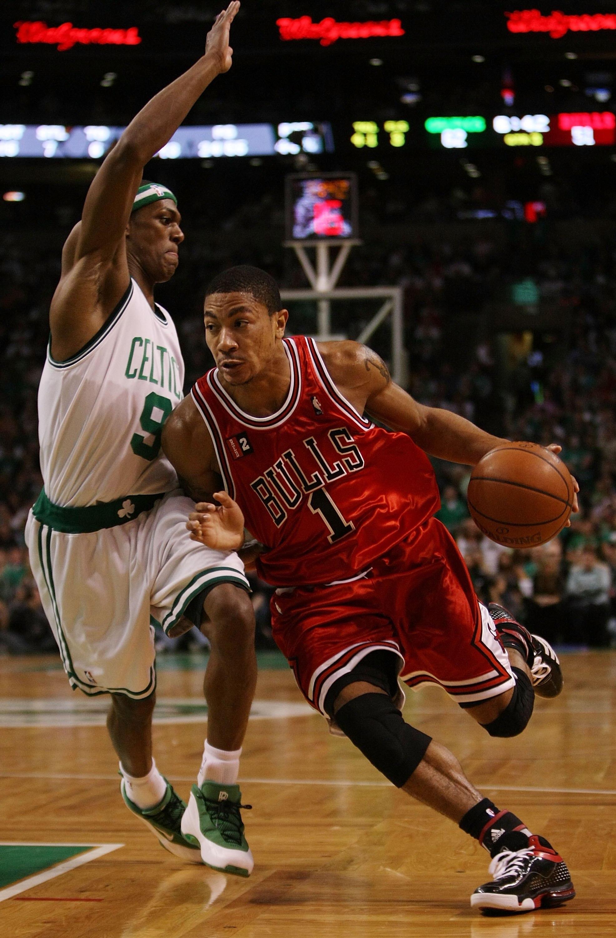 BOSTON - MAY 02:  Derrick Rose #1 of the Chicago Bulls drives to the net as Rajon Rondo #9 of the Boston Celtics defends in Game Seven of the Eastern Conference Quarterfinals during the 2009 NBA Playoffs at TD Banknorth Garden on May 2, 2009 in Boston, Ma