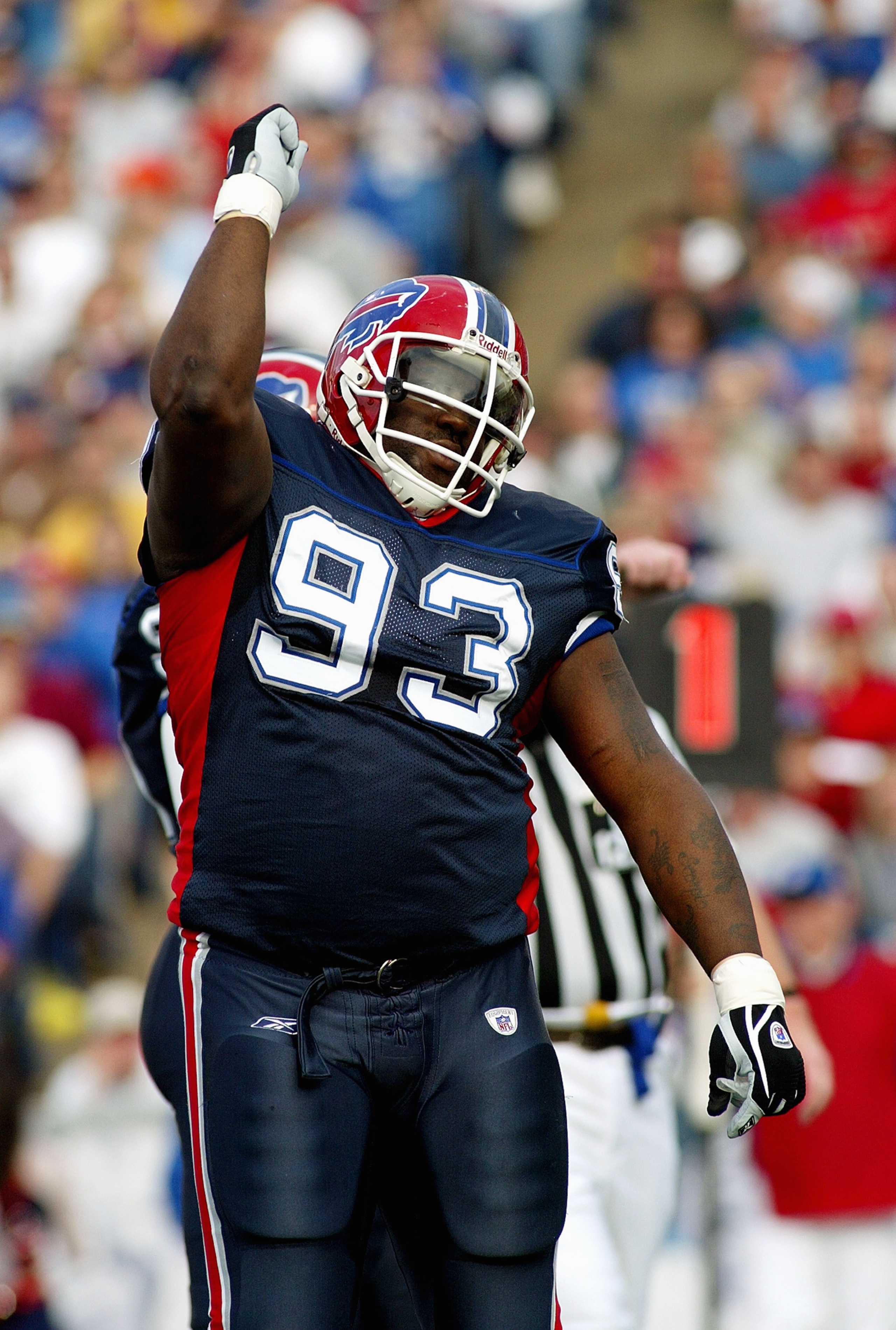 ORCHARD PARK, NY - NOVEMBER 23:  Pat Williams #93 of the Buffalo Bills celebrates a defensive play against the Indianapolis Colts on November 23, 2003 at Ralph Wilson Stadium in Orchard Park, New York. The Colts defeated the Bills 17-14. (Photo by Rick St