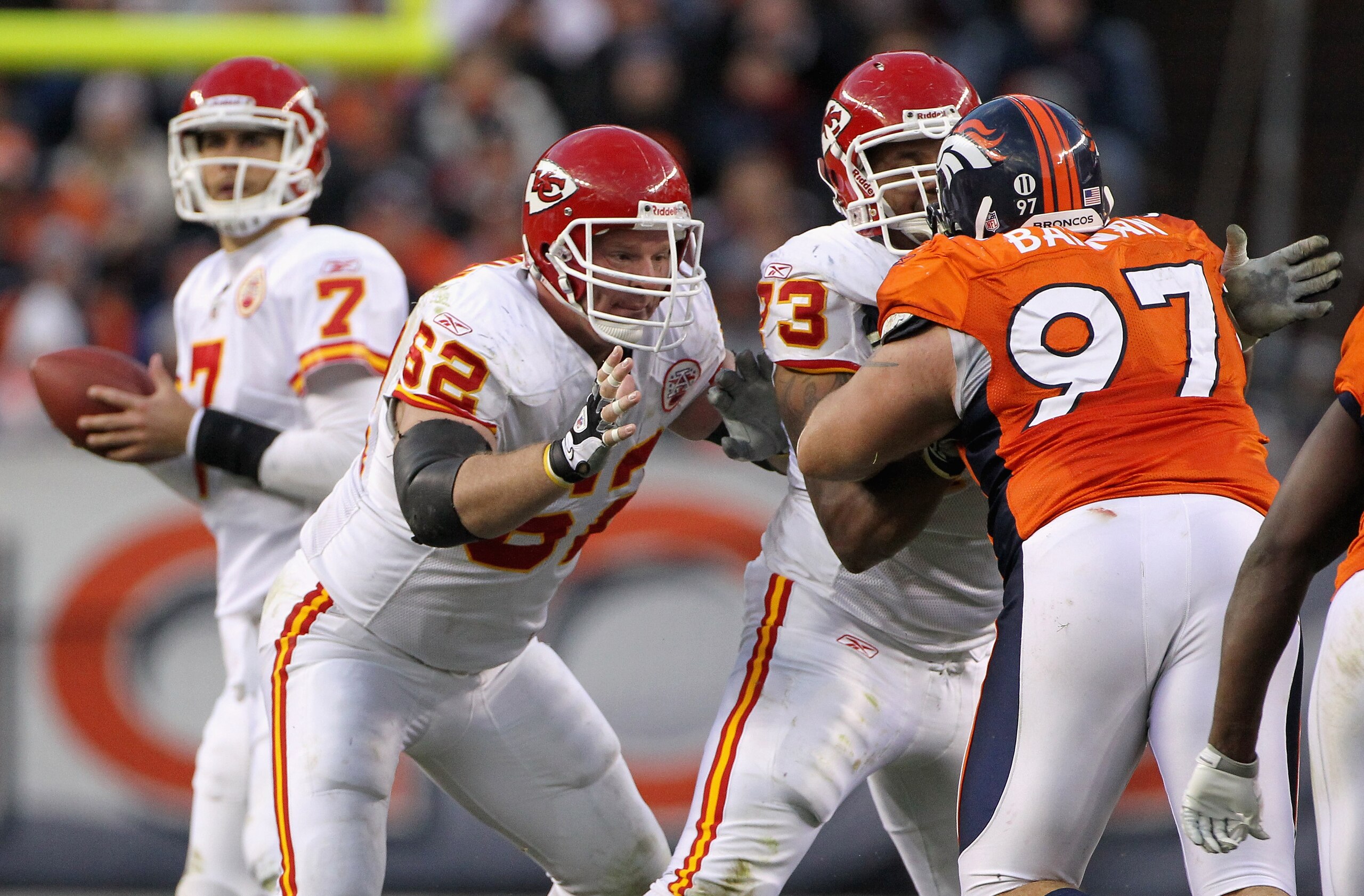 DENVER - NOVEMBER 14: Center Casey Wiegman #62 and Jon Asamoah #73 of the Kansas City Chiefs team up to block Justin Bannan #97 of the Denver Bronco to protect quarterback Matt Cassel #7 at INVESCO Field at Mile High on November 14, 2010 in Denver, Color DENVER - NOVEMBER 14: Center Casey Wiegman #62 and Jon Asamoah #73 of the Kansas City Chiefs team up to block Justin Bannan #97 of the Denver Bronco to protect quarterback Matt Cassel #7 at INVESCO Field at Mile High on November 14, 2010 in Denver, Color
