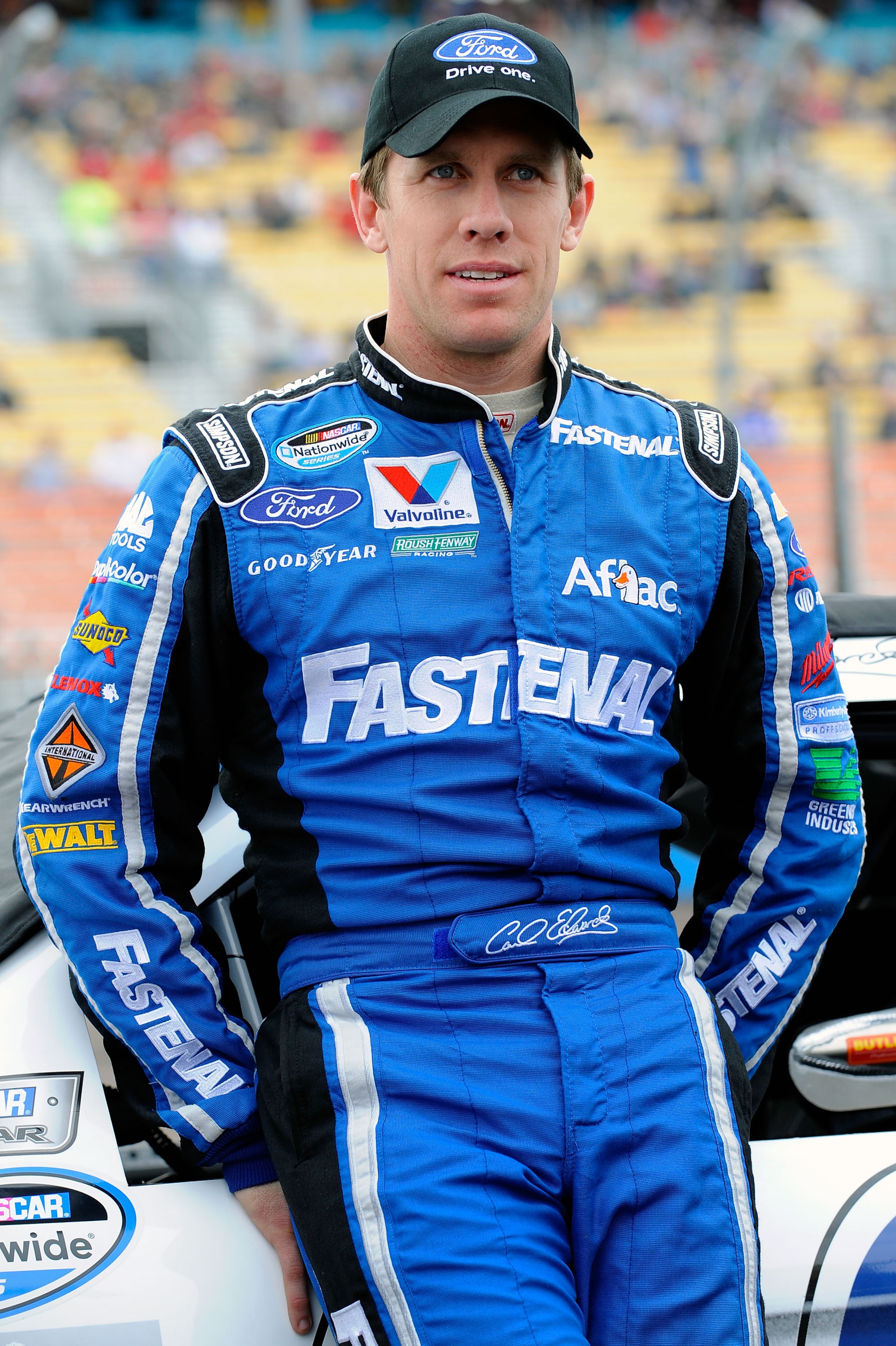 AVONDALE, AZ - FEBRUARY 26:  Carl Edwards, driver of the #60 Fastenal Ford, stands on pit road prior to the NASCAR Nationwide Series Bashas' Supermarkets 200 at Phoenix International Raceway on February 26, 2011 in Avondale, Arizona.  (Photo by Jared C. T