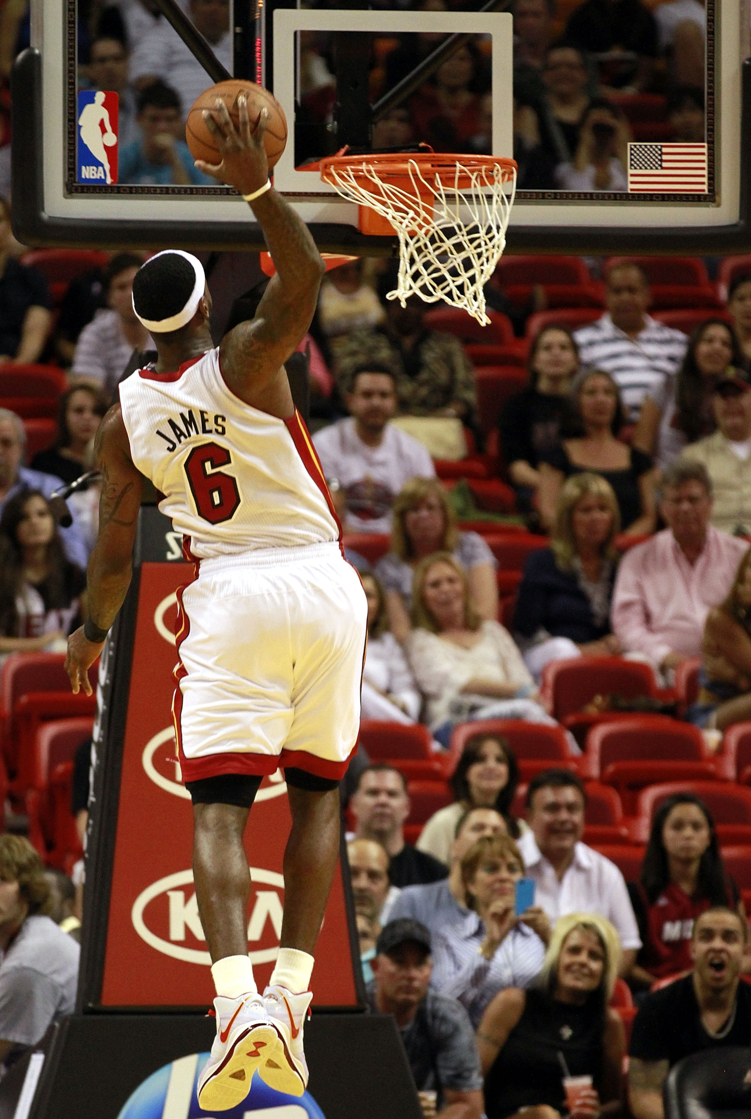 MIAMI, FL - MARCH 19:  Forward LeBron James #6 of the Miami Heat dunks against the Denver Nuggets at American Airlines Arena on March 19, 2011 in Miami, Florida. The Heat defeated the Nuggets 103-98. NOTE TO USER: User expressly acknowledges and agrees th