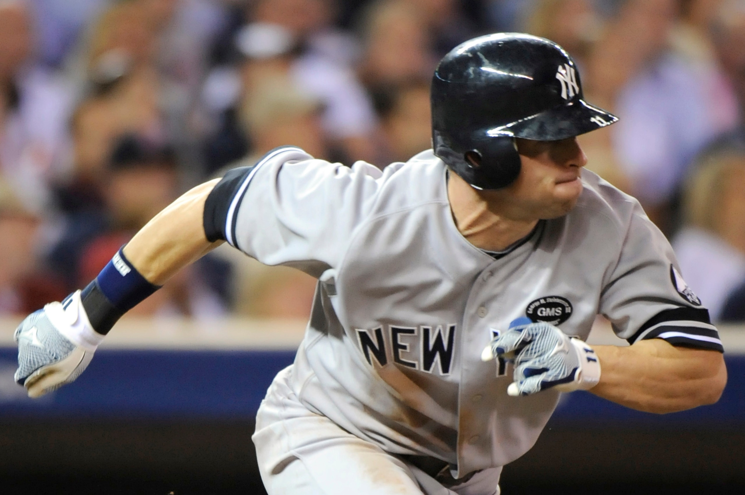 MINNEAPOLIS, MN - OCTOBER 7: Brett Gardner #11 of the New York Yankees runs to first on a single in the ninth during game two of the ALDS game against the Minnesota Twins on October 7, 2010 at Target Field in Minneapolis, Minnesota. (Photo by Hannah Fosli