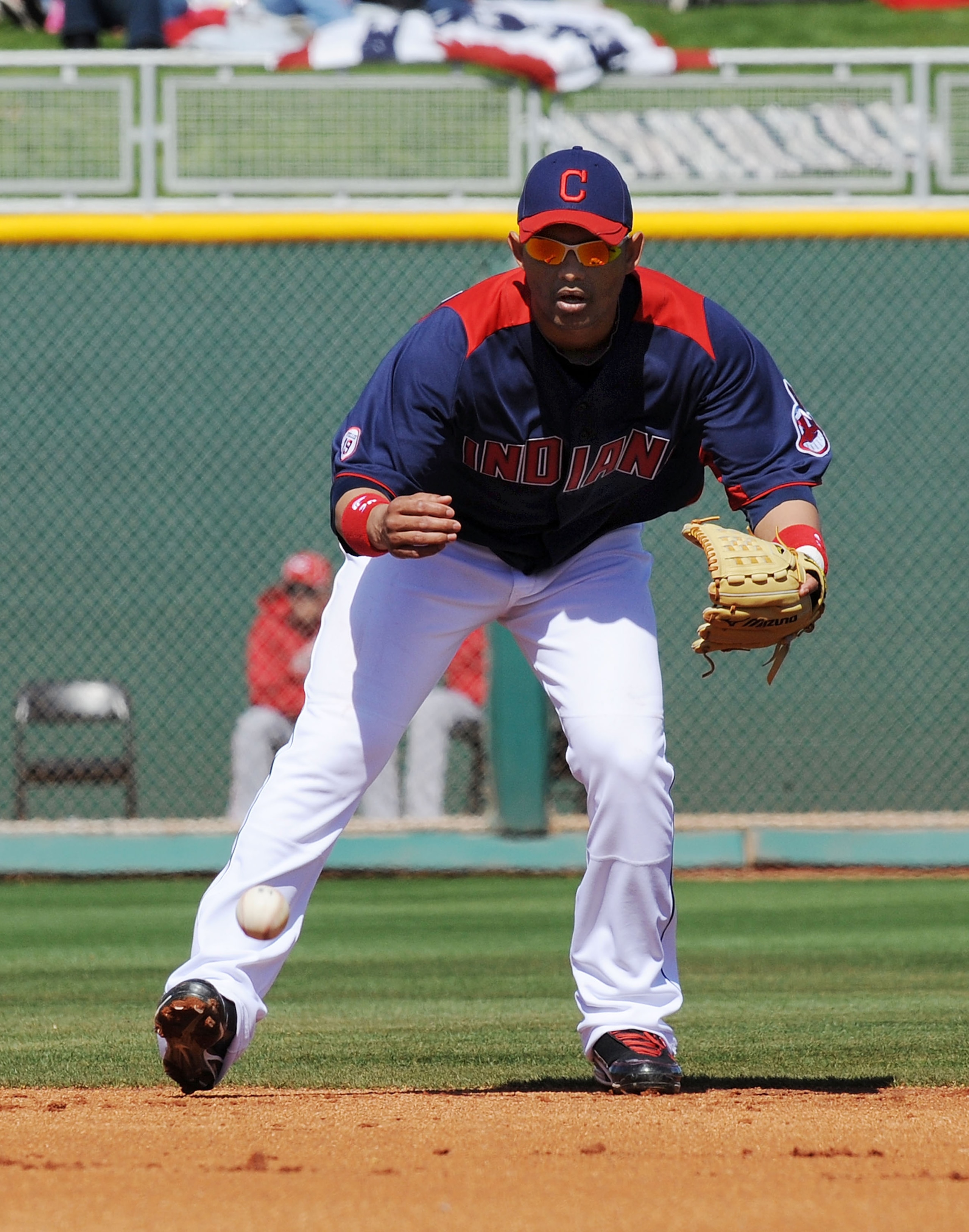 GOODYEAR, AZ - FEBRUARY 27:  Orlando Cabrera #20 of the Cleveland Indians gets ready to field a ground ball against the Cincinnati Reds at Goodyear Ballpark on February 27, 2011 in Goodyear, Arizona.  (Photo by Norm Hall/Getty Images)
