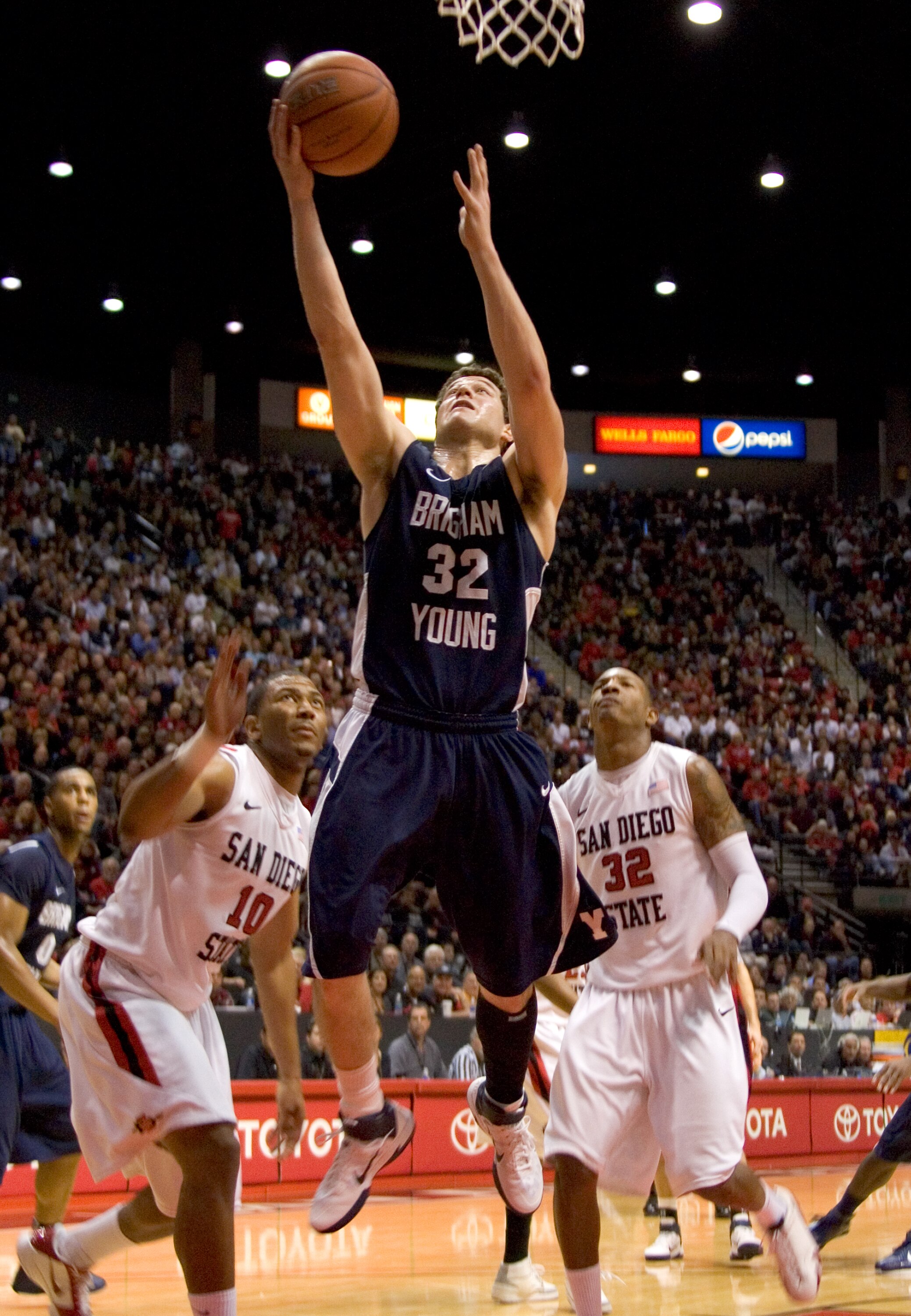 SAN DIEGO, CA - FEBRUARY 26:  Jimmer Fredette #32 of the Brigham Young Cougars shoots the ball against the San Diego State Aztecs during the second half at Cox Arena on February 26, 2011 in San Diego, California. BYU beat SDSU 80-67. (Photo by Kent Horner