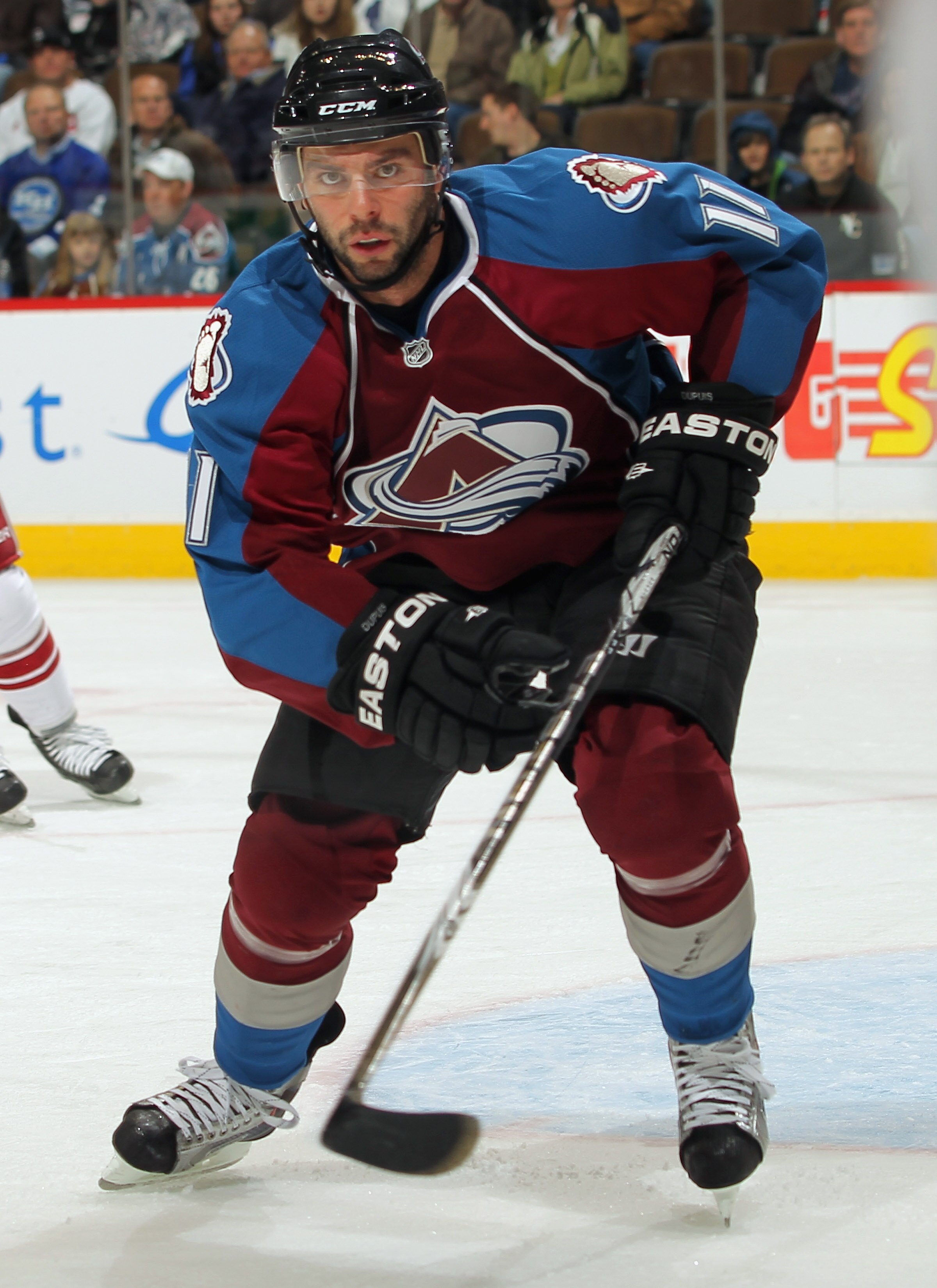 DENVER - JANUARY 06:  Philippe Dupuis #11 of the Colorado Avalanche skates against the Phoenix Coyotes at the Pepsi Center on January 6, 2011 in Denver, Colorado. The Coyotes defeated the Avalanche 2-0.  (Photo by Doug Pensinger/Getty Images)