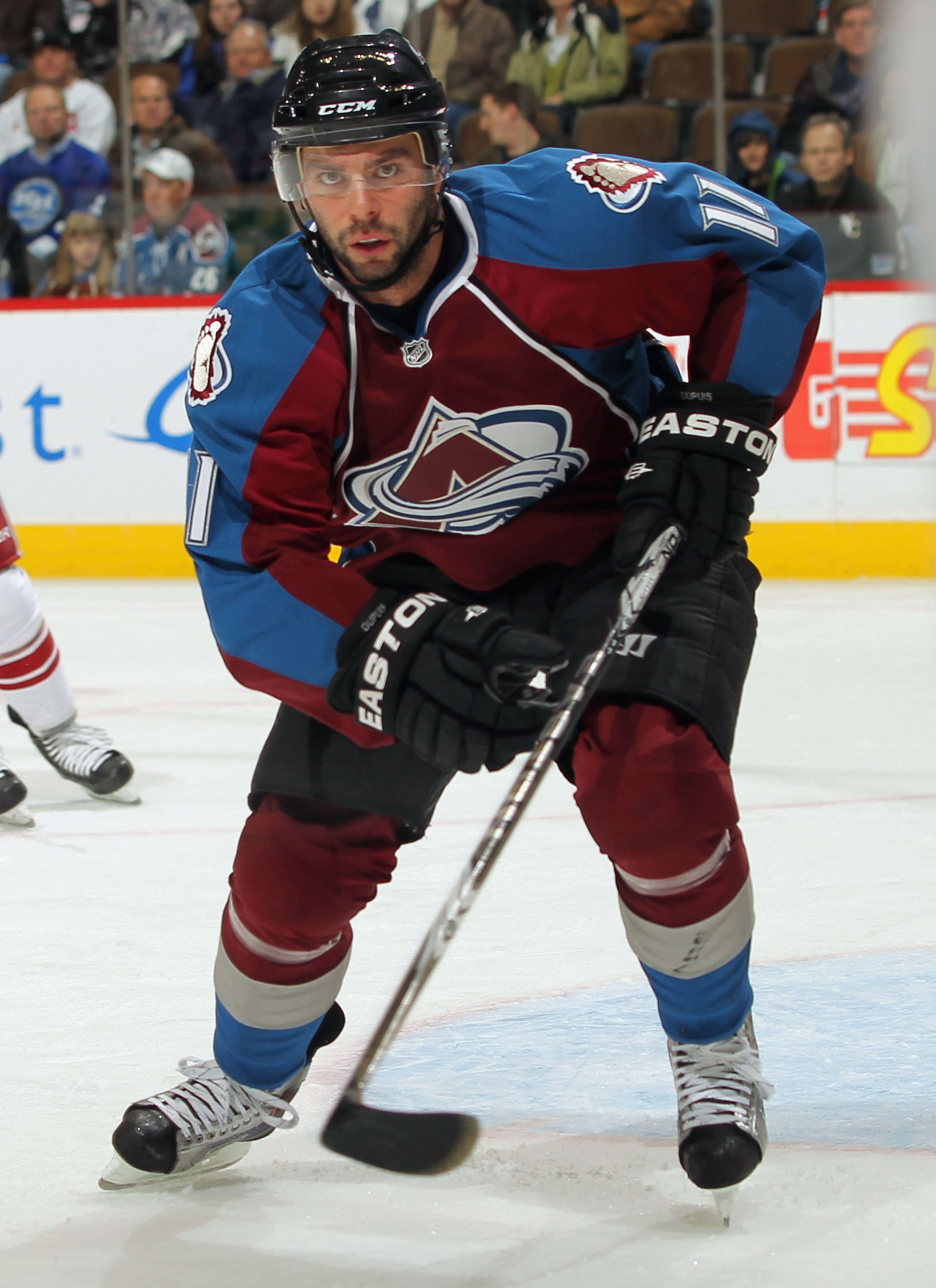 DENVER - JANUARY 06:  Philippe Dupuis #11 of the Colorado Avalanche skates against the Phoenix Coyotes at the Pepsi Center on January 6, 2011 in Denver, Colorado. The Coyotes defeated the Avalanche 2-0.  (Photo by Doug Pensinger/Getty Images)