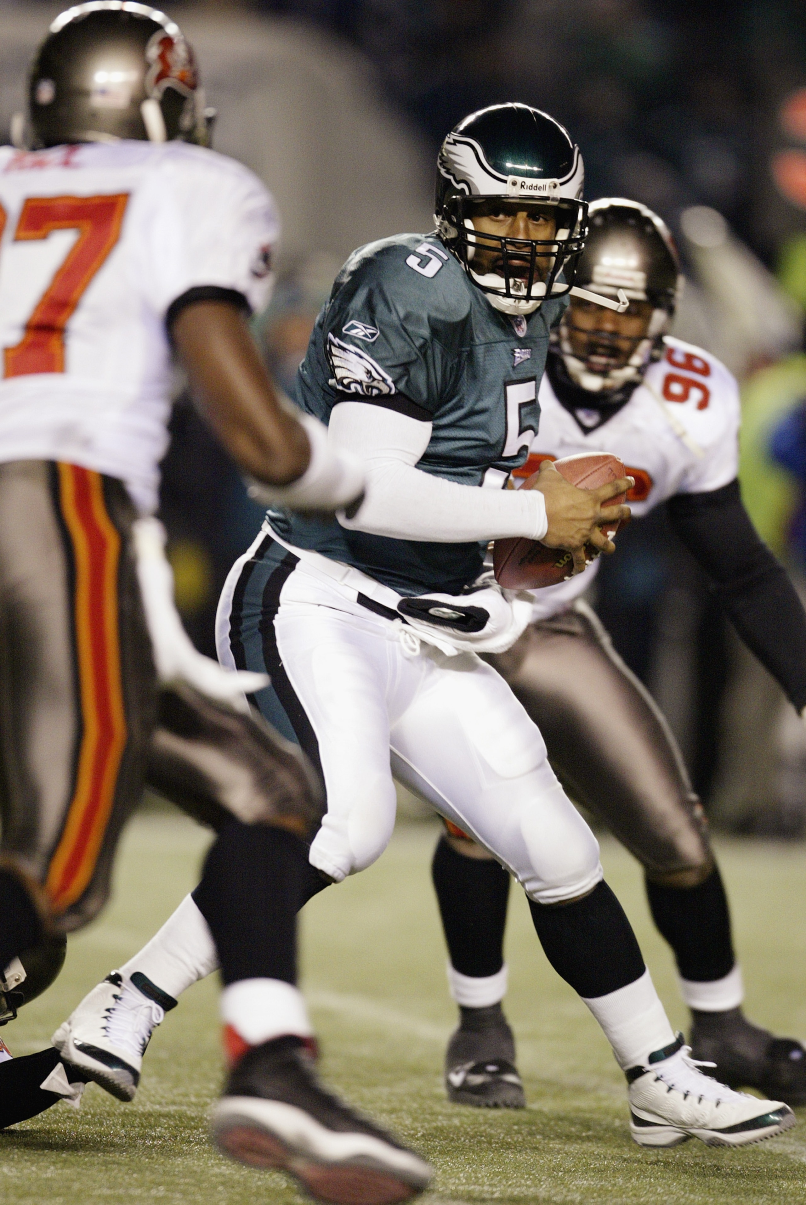 PHILADELPHIA - JANUARY 19: Quarterback Donovan McNabb #5 of the Philadelphia Eagles is under extreme pressure by Defensive ends Ellis Wyms #96 and Simeon Rice #97 of the Tampa Bay Buccanneers during the NFC Championship game at Veterans Stadium on Januar PHILADELPHIA - JANUARY 19: Quarterback Donovan McNabb #5 of the Philadelphia Eagles is under extreme pressure by Defensive ends Ellis Wyms #96 and Simeon Rice #97 of the Tampa Bay Buccanneers during the NFC Championship game at Veterans Stadium on Januar