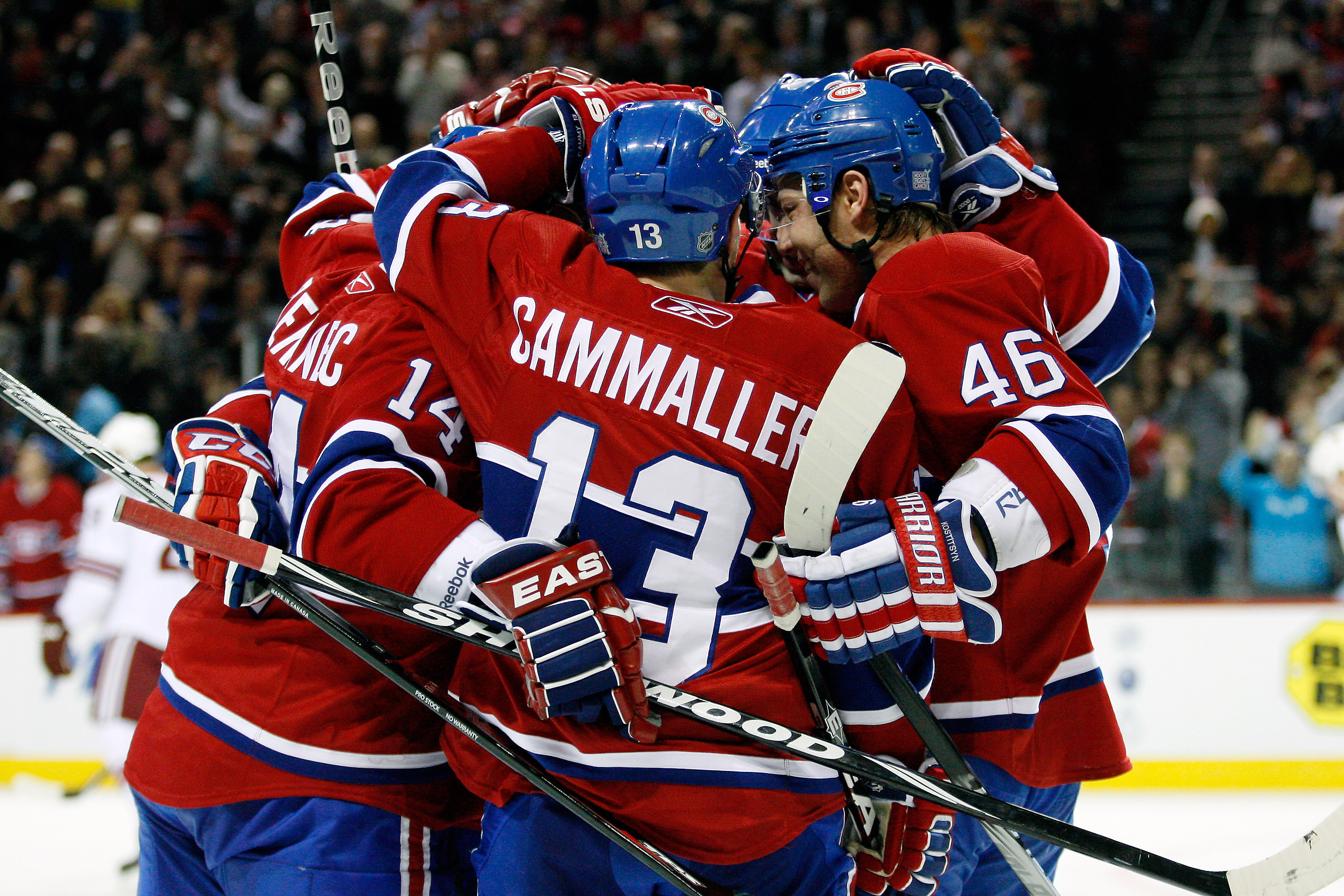 MONTREAL, QC - OCTOBER 25:  Tomas Plekanec #14 of the Montreal Canadiens celebrates his second period goal with team mates during the NHL game against the Phoenix Coyotes at the Bell Centre on October 25, 2010 in Montreal, Quebec, Canada.  The Canadiens d