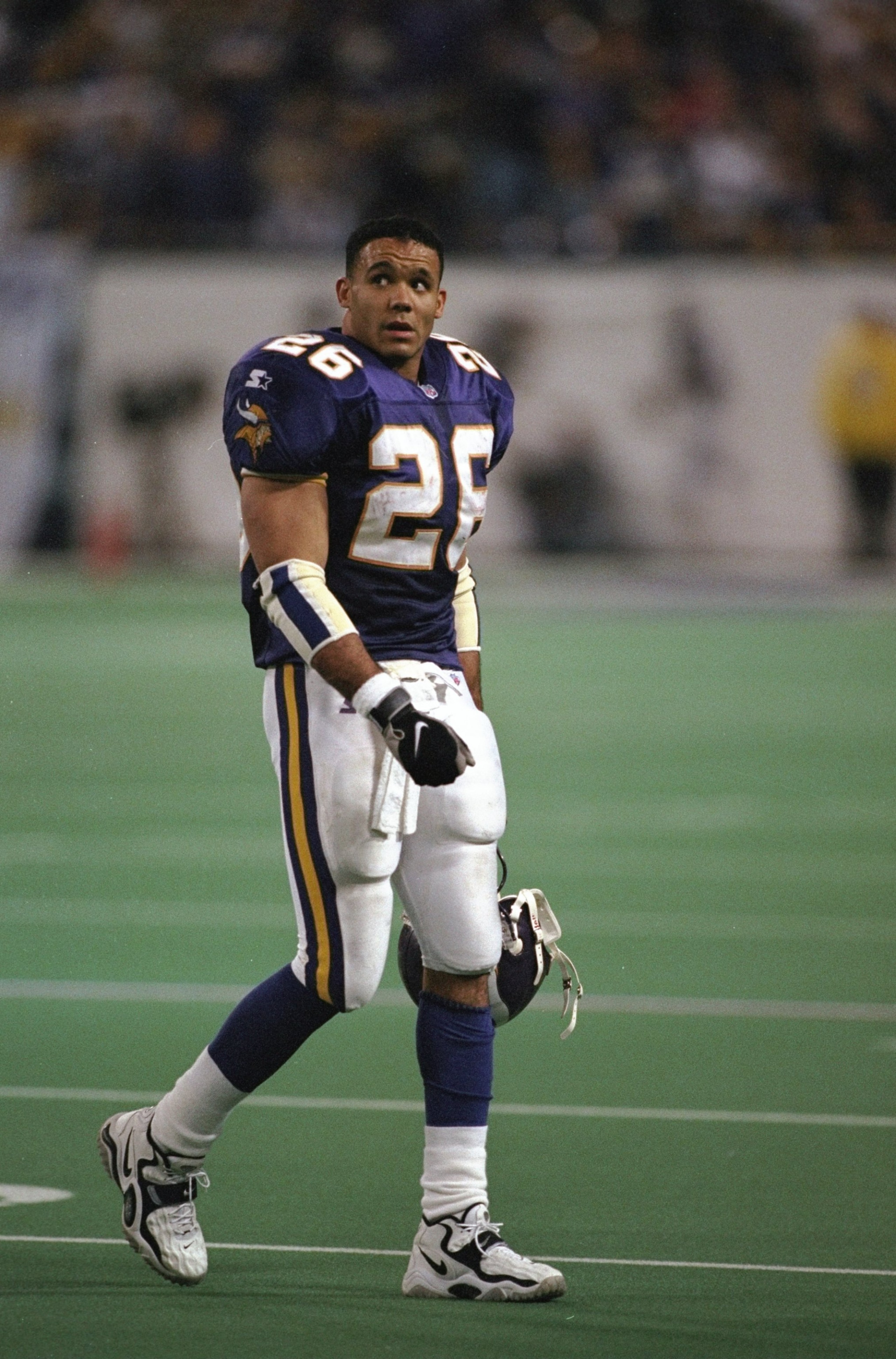 17 Jan 1999: Robert Smith #26 of the Minnesota Vikings walking off the field during the NFC Championship Game against the Atlanta Falcons at the H. H. H. Metrodome in Minneapolis, Minnesota. The Falcons defeated the Vikings 30-27 in overtime. Mandatory C 17 Jan 1999: Robert Smith #26 of the Minnesota Vikings walking off the field during the NFC Championship Game against the Atlanta Falcons at the H. H. H. Metrodome in Minneapolis, Minnesota. The Falcons defeated the Vikings 30-27 in overtime. Mandatory C
