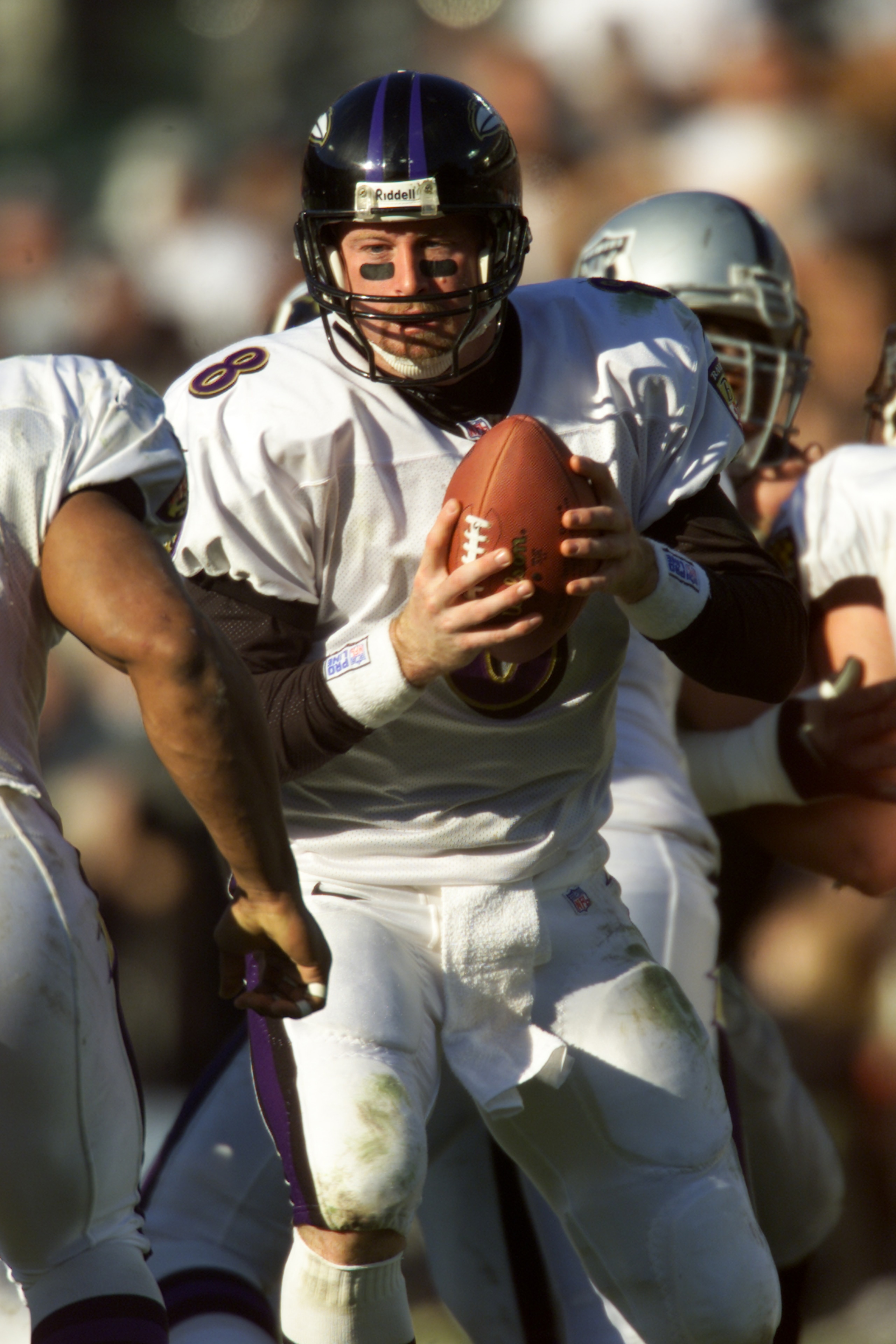 14 Jan 2001: Quarterback Trent Dilfer #8 of the Baltimore Ravens looks to hand the ball off against the Oakland Raiders during the AFC Championship at Network Associates Coliseum in Oakland, California. The Ravens beat the Raiders 16-3 to go on to the S 14 Jan 2001: Quarterback Trent Dilfer #8 of the Baltimore Ravens looks to hand the ball off against the Oakland Raiders during the AFC Championship at Network Associates Coliseum in Oakland, California. The Ravens beat the Raiders 16-3 to go on to the S