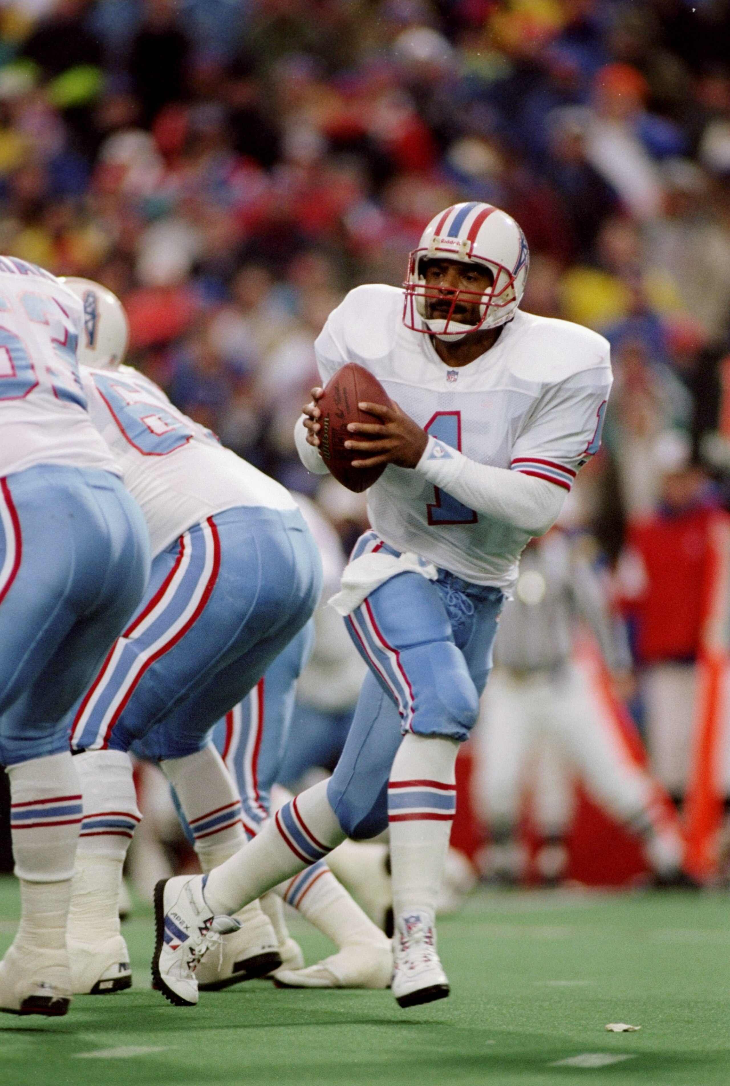 3 Jan 1993: Quarterback Warren Moon of the Houston Oilers scrambles with the ball during a game against the Buffalo Bills at Rich Stadium in Orchard Park, New York. The Bills won the game 41-38. Mandatory Credit: Rick Stewart /Allsport 3 Jan 1993: Quarterback Warren Moon of the Houston Oilers scrambles with the ball during a game against the Buffalo Bills at Rich Stadium in Orchard Park, New York. The Bills won the game 41-38. Mandatory Credit: Rick Stewart /Allsport