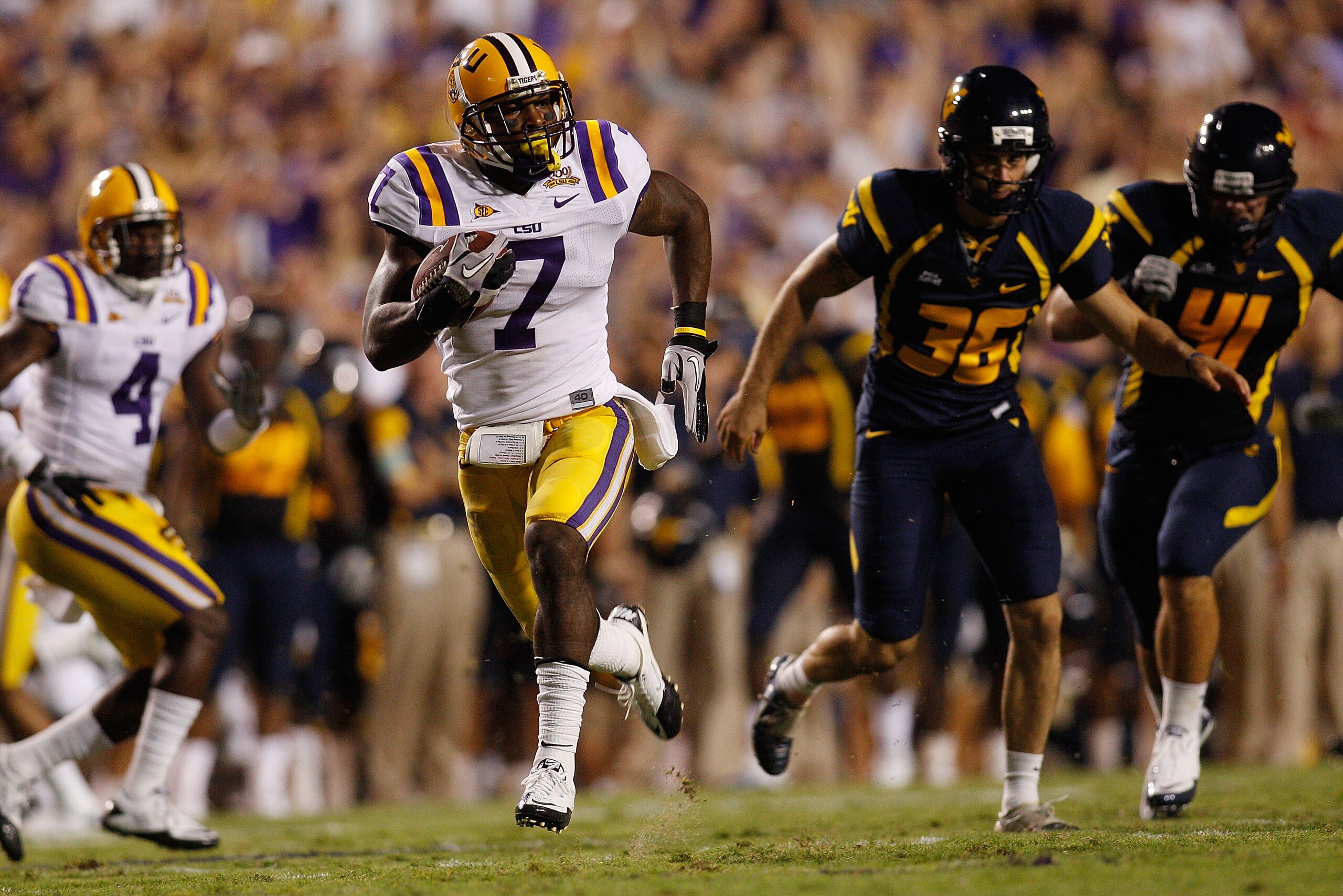 BATON ROUGE, LA - SEPTEMBER 25: Patrick Peterson #7 of the Louisiana State Univeristy Tigers runs for a touchdown against the West Virginia Mountaineers at Tiger Stadium on September 25, 2010 in Baton Rouge, Louisiana. (Photo by Chris Graythen/Getty Ima BATON ROUGE, LA - SEPTEMBER 25: Patrick Peterson #7 of the Louisiana State Univeristy Tigers runs for a touchdown against the West Virginia Mountaineers at Tiger Stadium on September 25, 2010 in Baton Rouge, Louisiana. (Photo by Chris Graythen/Getty Ima