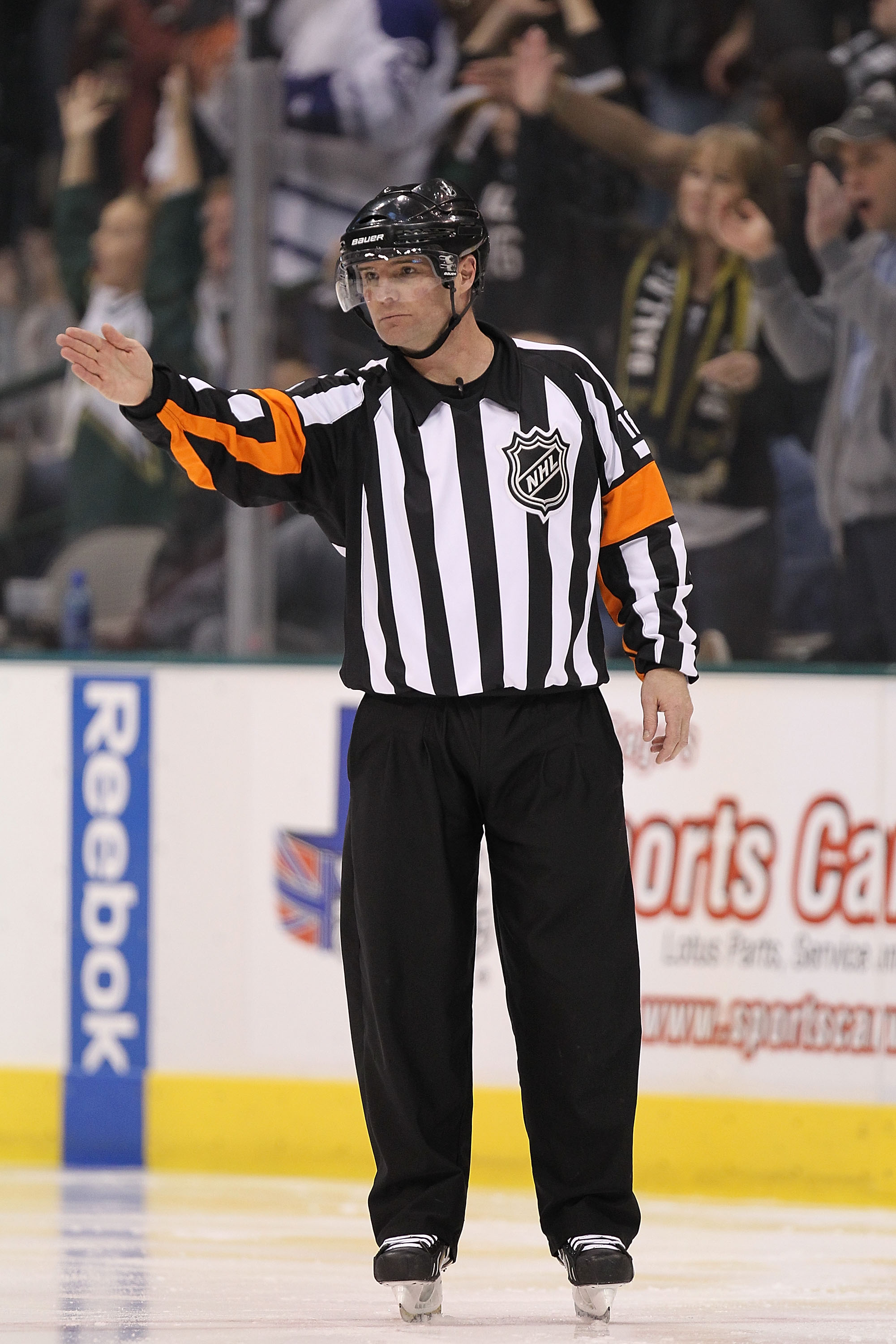 DALLAS, TX - FEBRUARY 11:  NHL referee Greg Kimmerly #18 at American Airlines Center on February 11, 2011 in Dallas, Texas.  (Photo by Ronald Martinez/Getty Images)