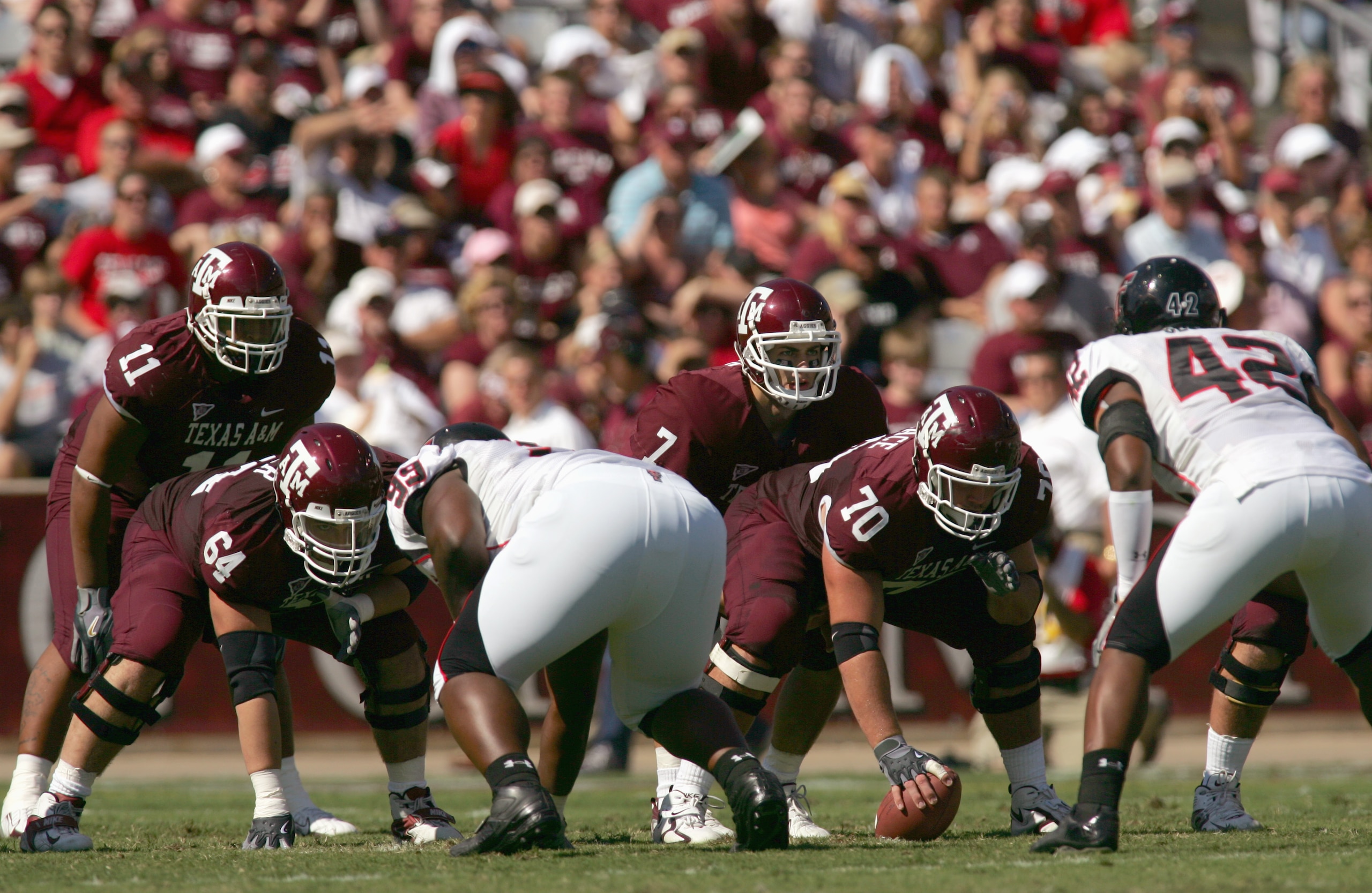 COLLEGE STATION, TX -SEPTEMBER 30: Quarterback  Stephen McGee #7 of the Texas A&M Aggies at the line of scrimmage during the game against the Texas Tech Red Raiders at Kyle Field on September 30, 2006 in College Station, Texas. (Photo by Ronald Martinez/G