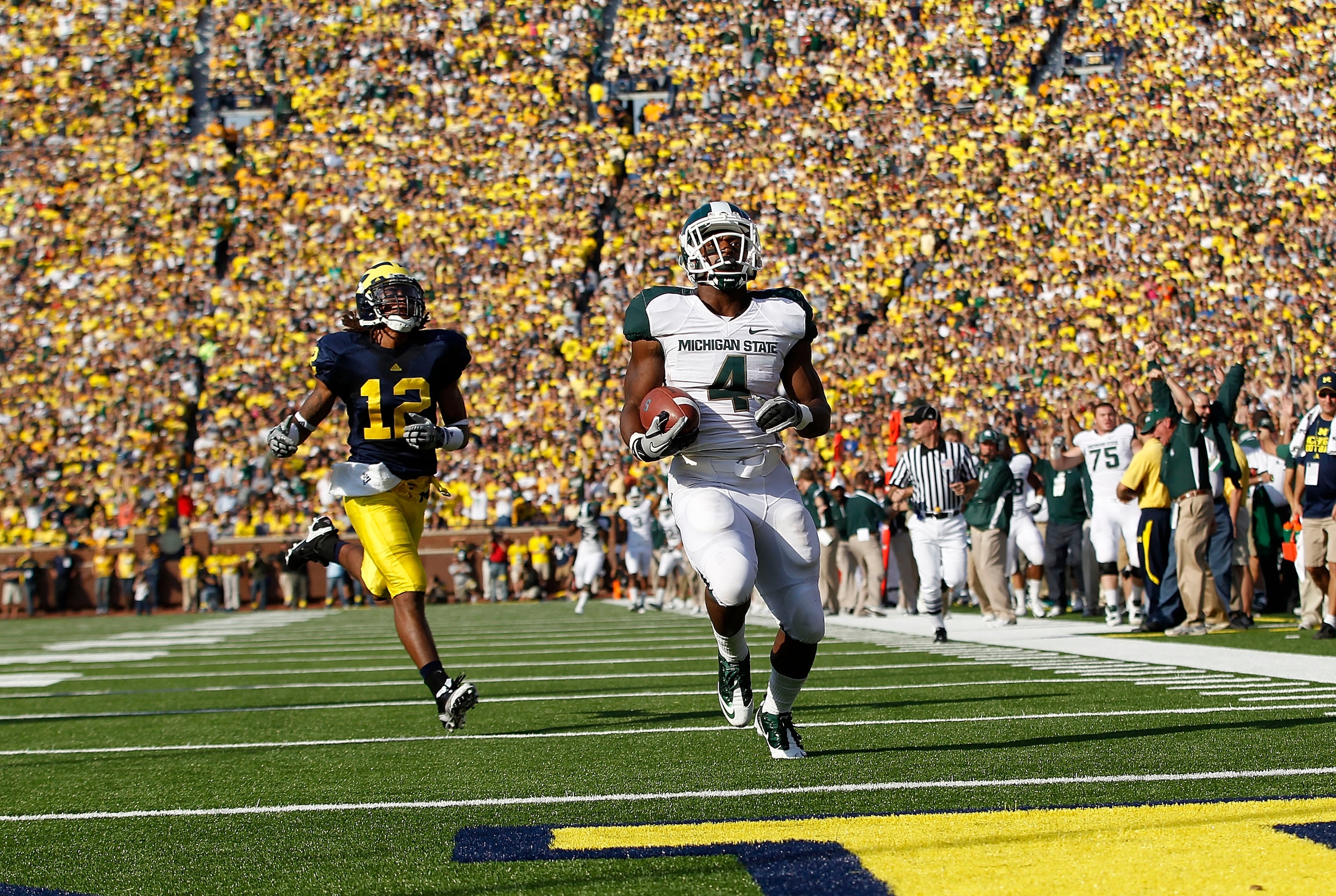 ANN ARBOR, MI - OCTOBER 09:  Edwin Baker #4 of the Michigan State Spartans scores on a 61 yard touchdown in the second quarter against the Michigan Wolverines during the game on October 9, 2010 at Michigan Stadium in Ann Arbor, Michigan. The Michigan Stat