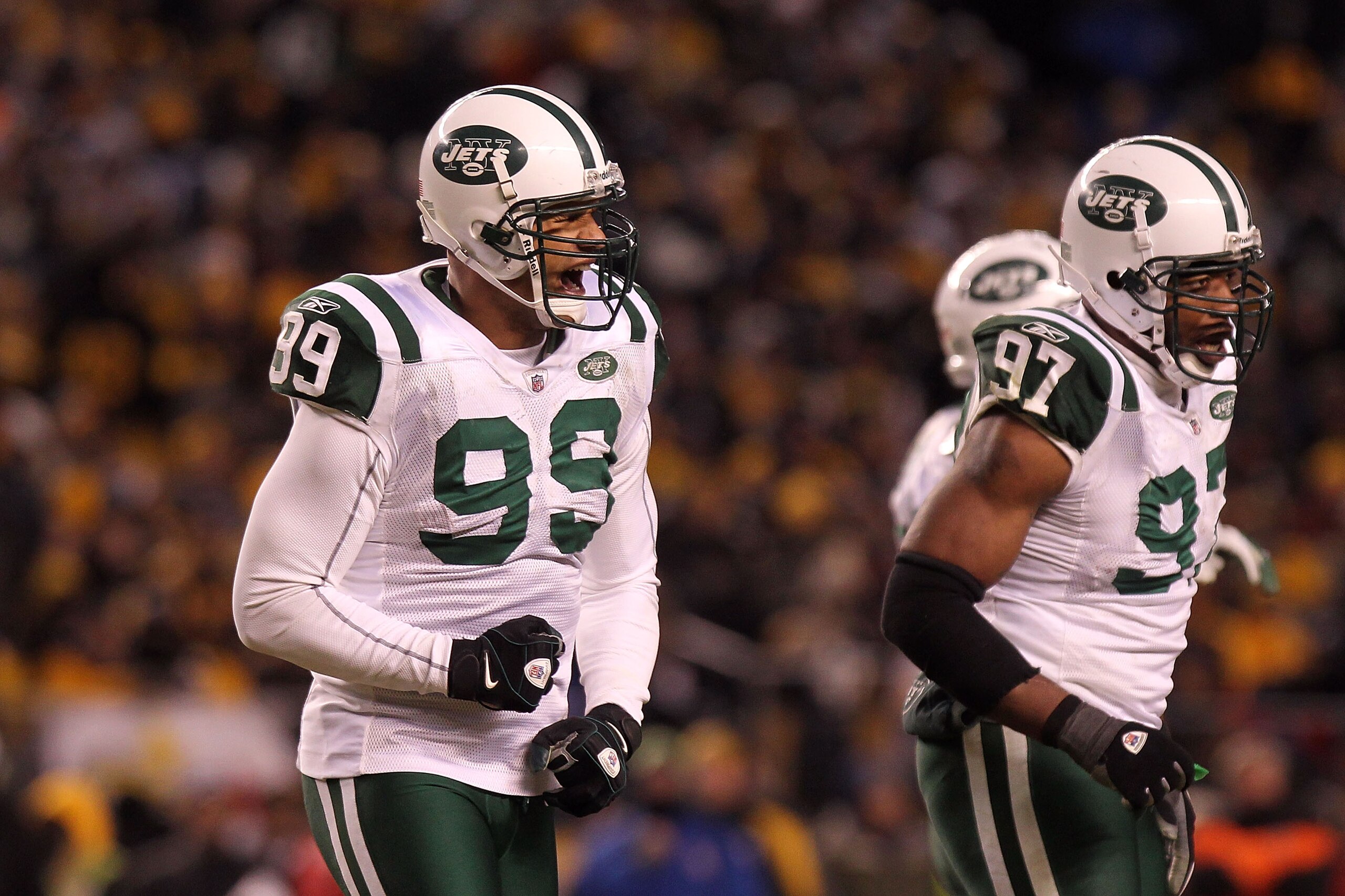 PITTSBURGH, PA - JANUARY 23:  Jason Taylor #99 of the New York Jets reacts after sacking Ben Roethlisberger #7 of the Pittsburgh Steelers as Calvin Pace #97 of the New York Jets looks on during the 2011 AFC Championship game at Heinz Field on January 23,