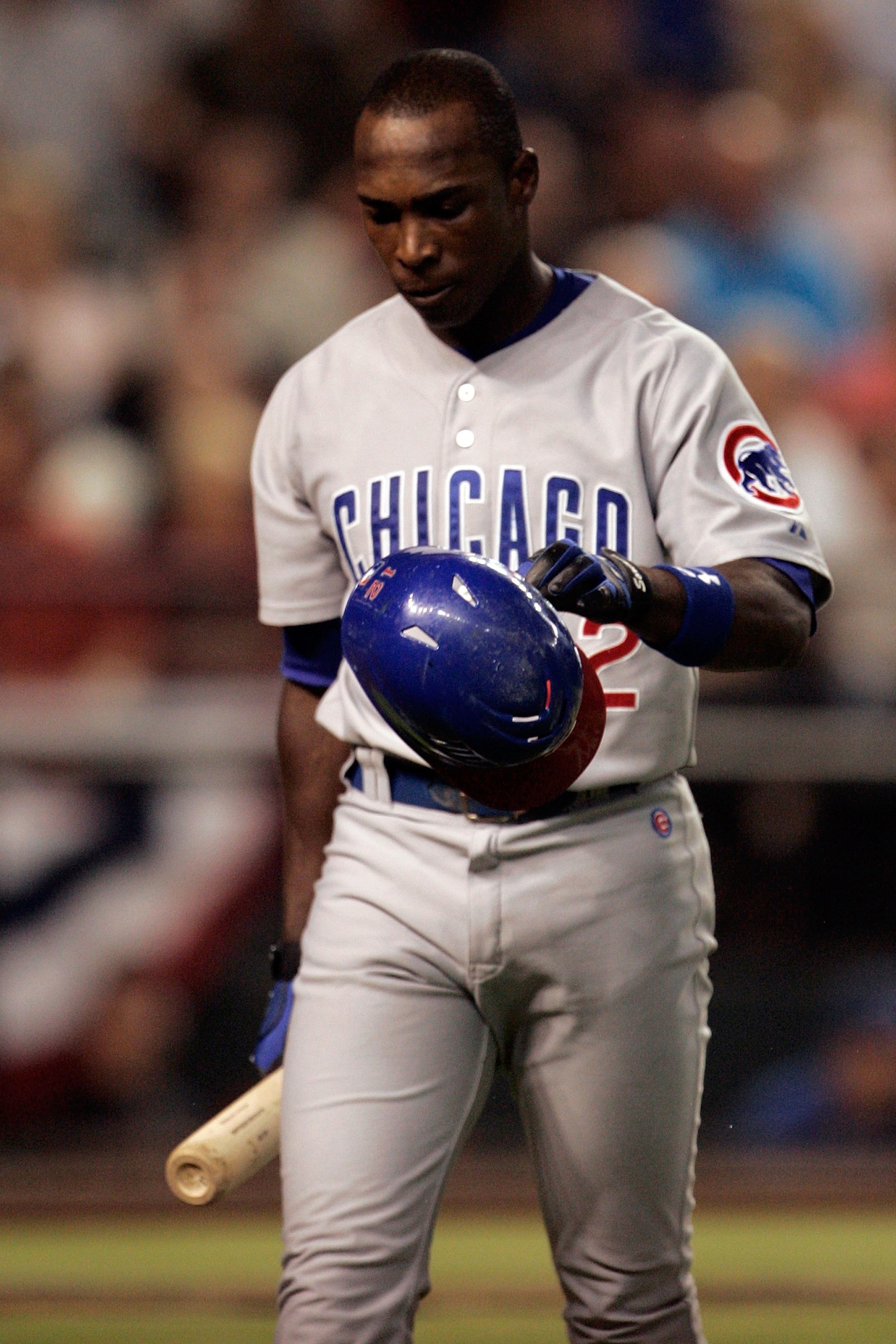 PHOENIX - OCTOBER 03: Alfonso Soriano #12 of the Chicago Cubs reacts after striking out in the third inning against the Arizona Diamondbacks during Game One of the National League Divisional Series at Chase Field on October 3, 2007 in Phoenix, Arizona. PHOENIX - OCTOBER 03: Alfonso Soriano #12 of the Chicago Cubs reacts after striking out in the third inning against the Arizona Diamondbacks during Game One of the National League Divisional Series at Chase Field on October 3, 2007 in Phoenix, Arizona.