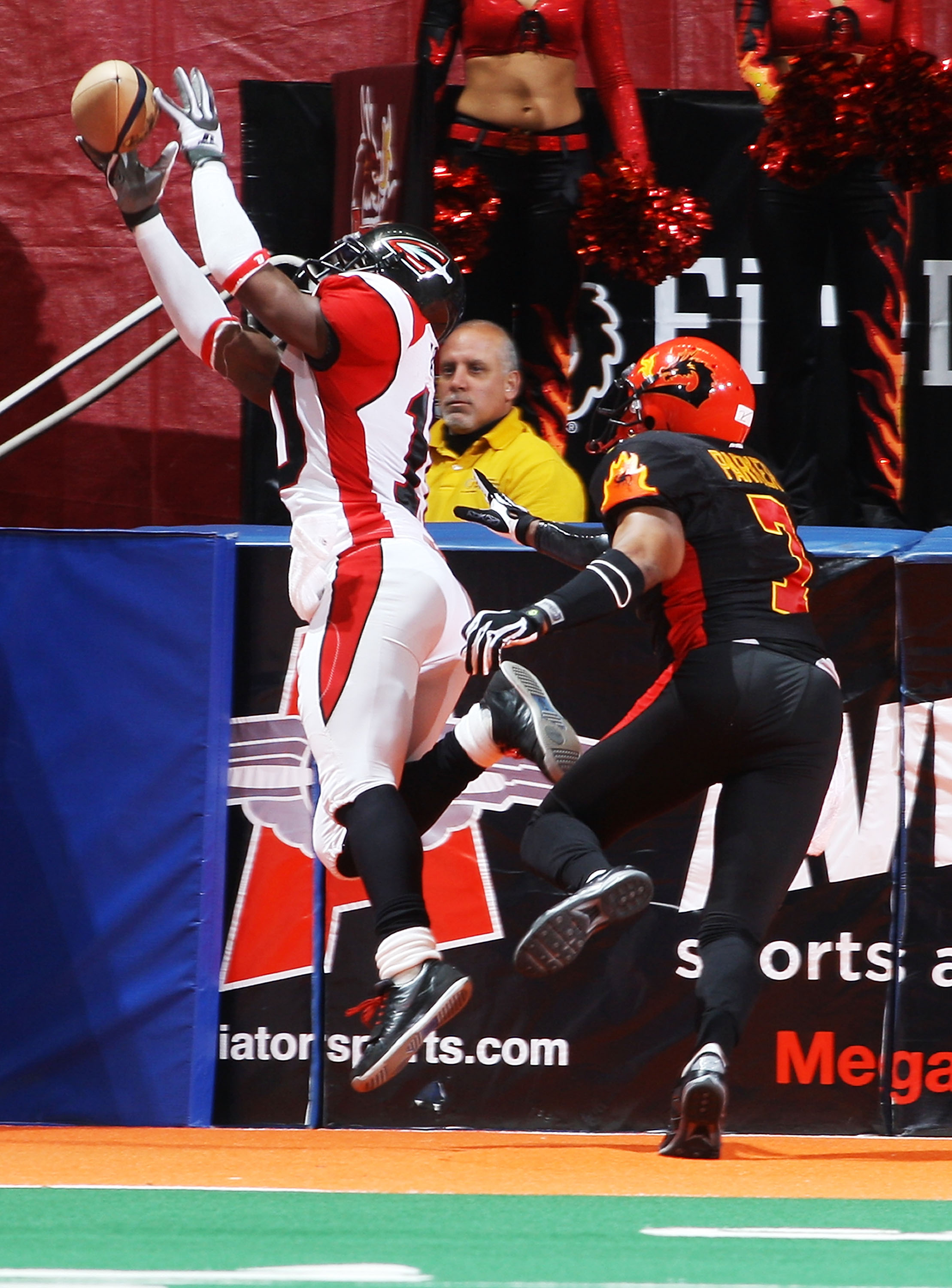 UNIONDALE, NY - APRIL 26: Billy Parker #7 of the New York Dragons watches Otis Amey #10 of the Cleveland Gladiators unable hold onto the ball on April 26, 2008 at Nassau Coliseum in Uniondale, New York. Dragons defeat Gladiators 56-39. (Photo by Mike S