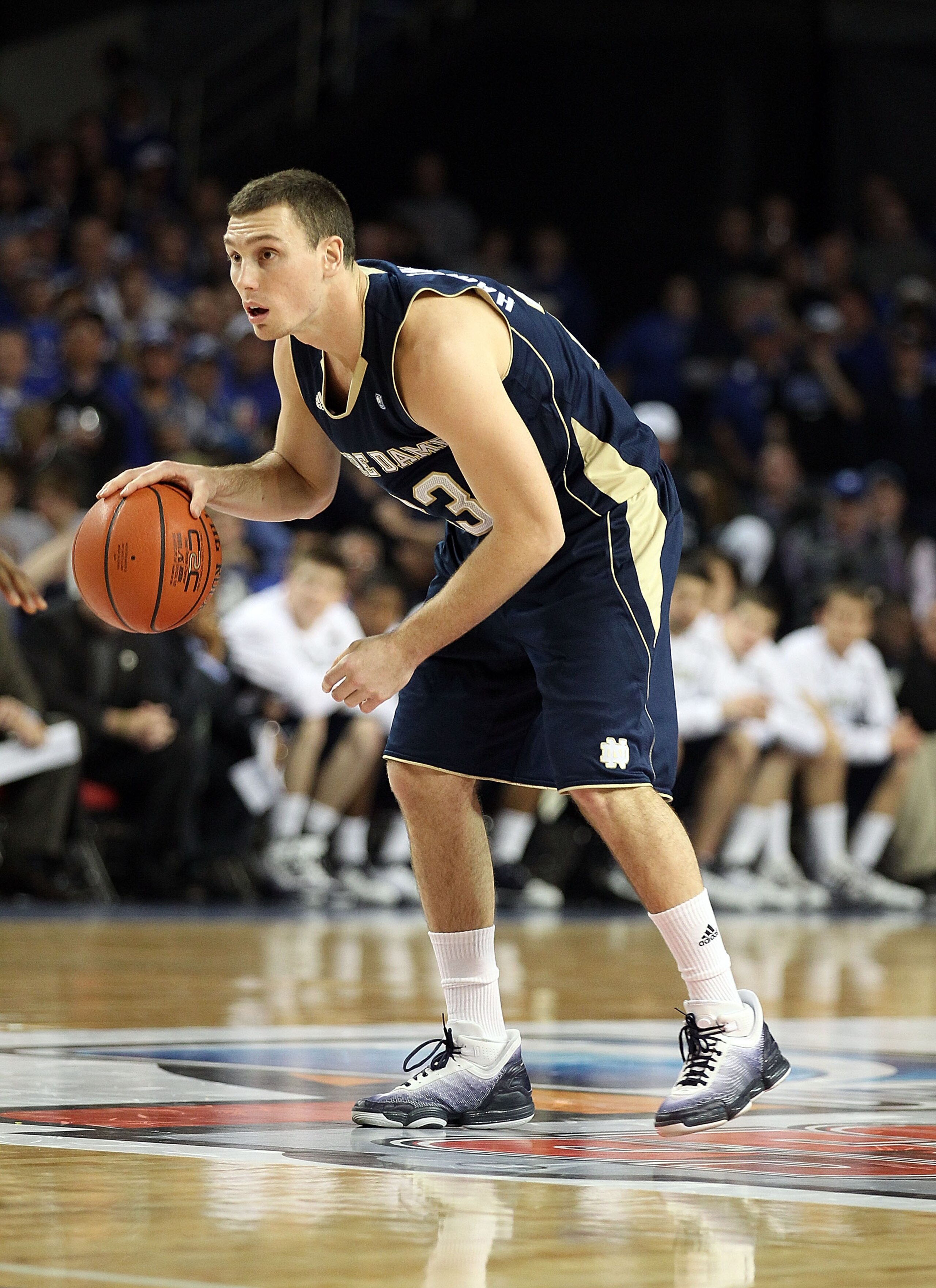 LOUISVILLE, KY - DECEMBER 08:  Ben Hansbrough #23 of the Notre Dame Fighting Irish dribbles the ball during the game against the Kentucky Wildcats in the 2010 DIRECTV SEC/BIG EAST Invitational at Freedom Hall on December 8, 2010 in Louisville, Kentucky.  