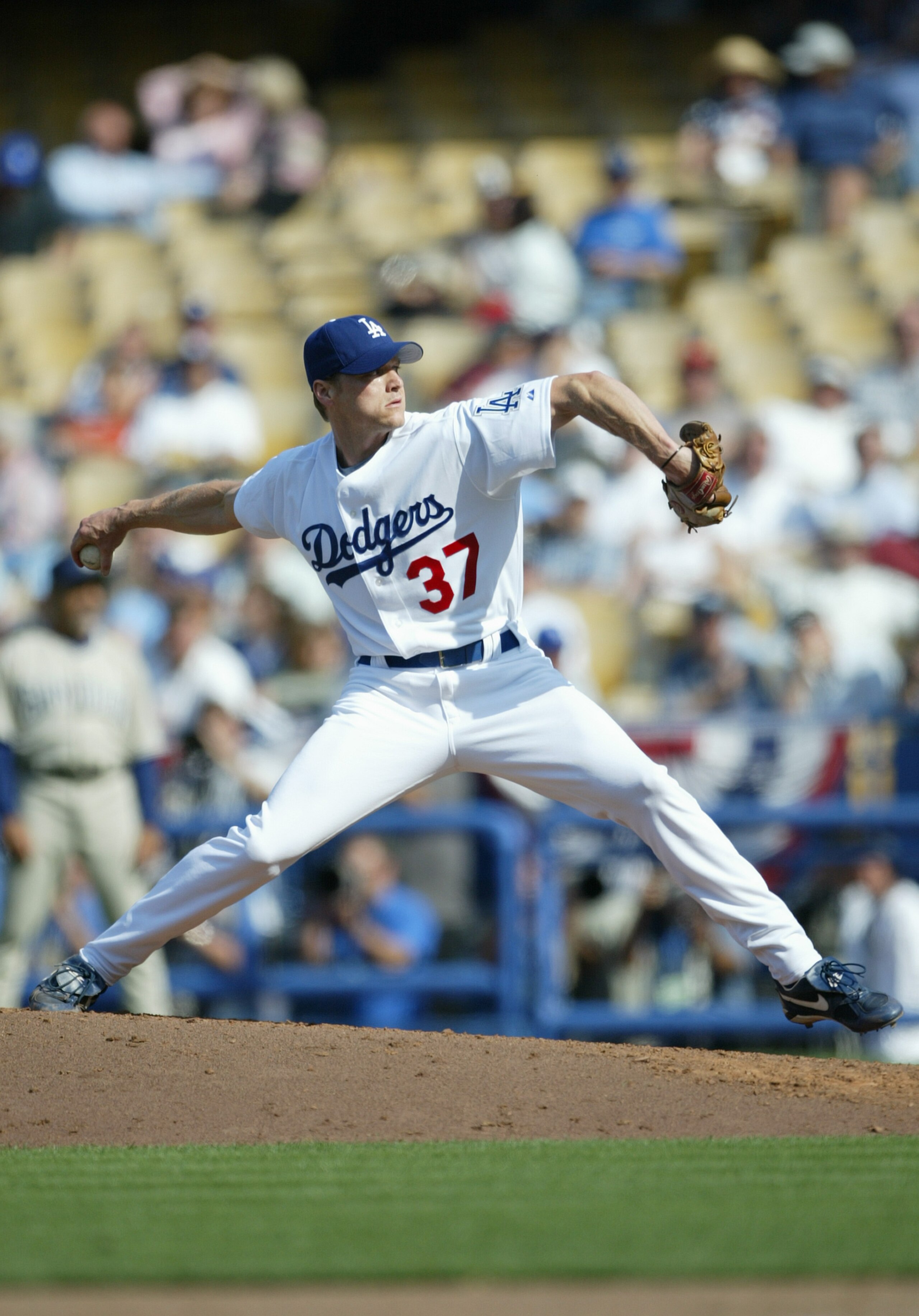 LOS ANGELES - APRIL 5: Pitcher Darren Dreifort #37 of the Los Angeles Dodgers winds back to pitch during the game against the San Diego Padres on April 5, 2004 at Dodger Stadium in Los Angeles, California. The Padres defeated the Dodgers 8-2 in the seaso LOS ANGELES - APRIL 5: Pitcher Darren Dreifort #37 of the Los Angeles Dodgers winds back to pitch during the game against the San Diego Padres on April 5, 2004 at Dodger Stadium in Los Angeles, California. The Padres defeated the Dodgers 8-2 in the seaso