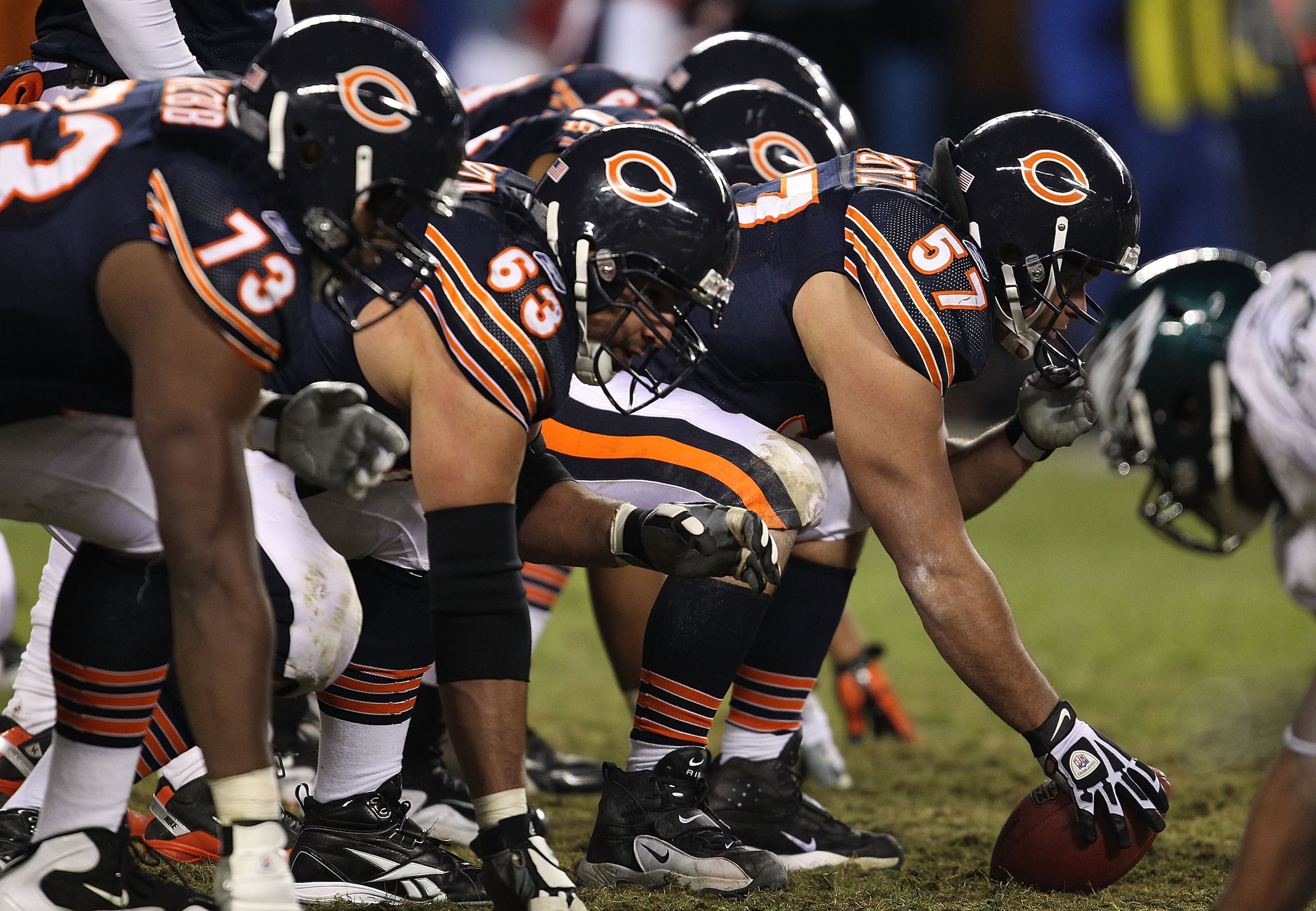 CHICAGO - NOVEMBER 28: (L-R) J'Marcus Webb #73 and Roberto Garza #63 of the Chicago Bears await the snap of Olin Kreutz #57 against the Philadelphia Eagles at Soldier Field on November 28, 2010 in Chicago, Illinois. The Bears defeated the Eagles 31-26. (P CHICAGO - NOVEMBER 28: (L-R) J'Marcus Webb #73 and Roberto Garza #63 of the Chicago Bears await the snap of Olin Kreutz #57 against the Philadelphia Eagles at Soldier Field on November 28, 2010 in Chicago, Illinois. The Bears defeated the Eagles 31-26. (P