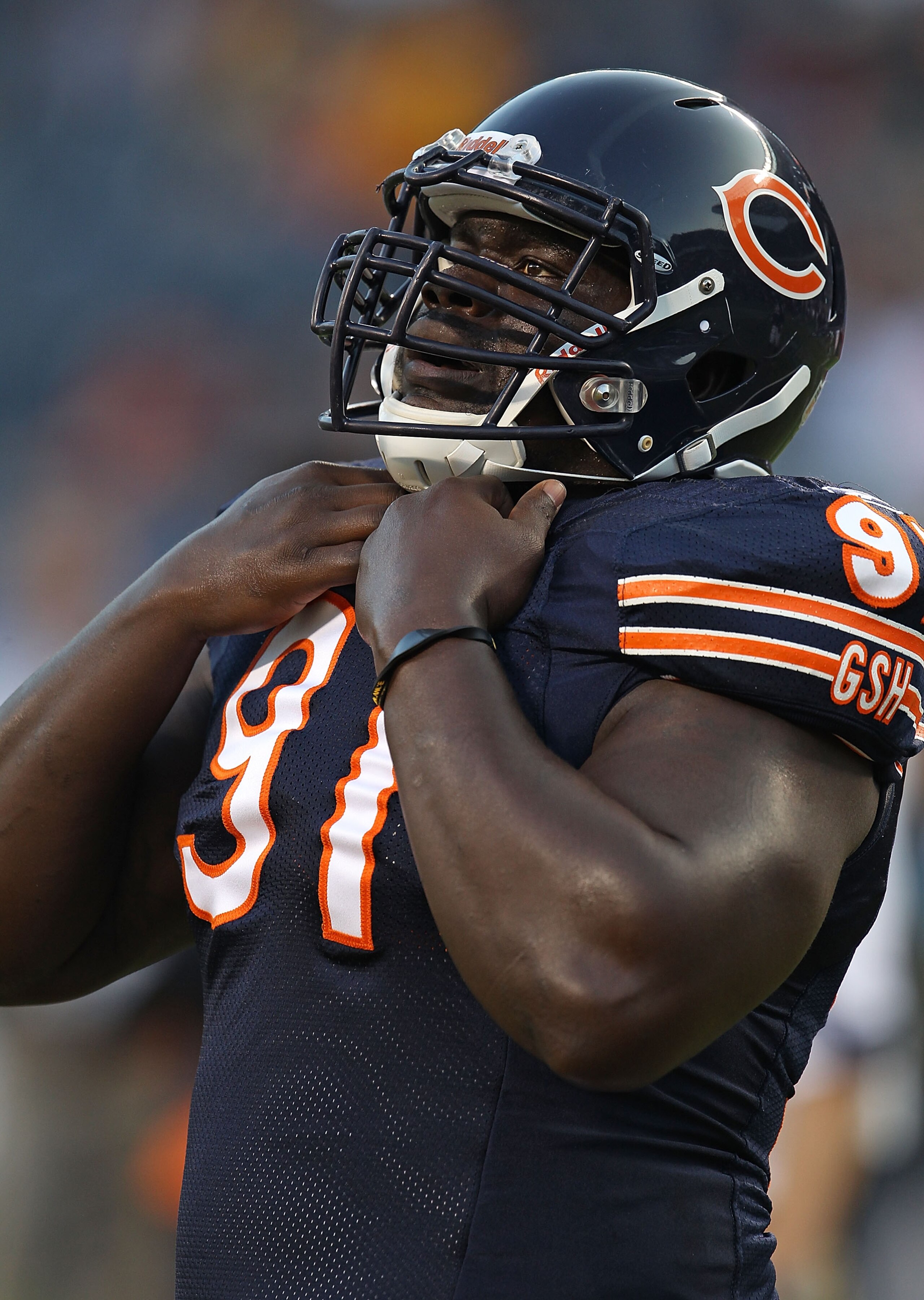 CHICAGO - AUGUST 21: Tommie Harris #91 of the Chicago Bears warms-up before a preseason game against the Oakland Raiders at Soldier Field on August 21, 2010 in Chicago, Illinois. The Raiders defeated the Bears 32-17. (Photo by Jonathan Daniel/Getty Images CHICAGO - AUGUST 21: Tommie Harris #91 of the Chicago Bears warms-up before a preseason game against the Oakland Raiders at Soldier Field on August 21, 2010 in Chicago, Illinois. The Raiders defeated the Bears 32-17. (Photo by Jonathan Daniel/Getty Images