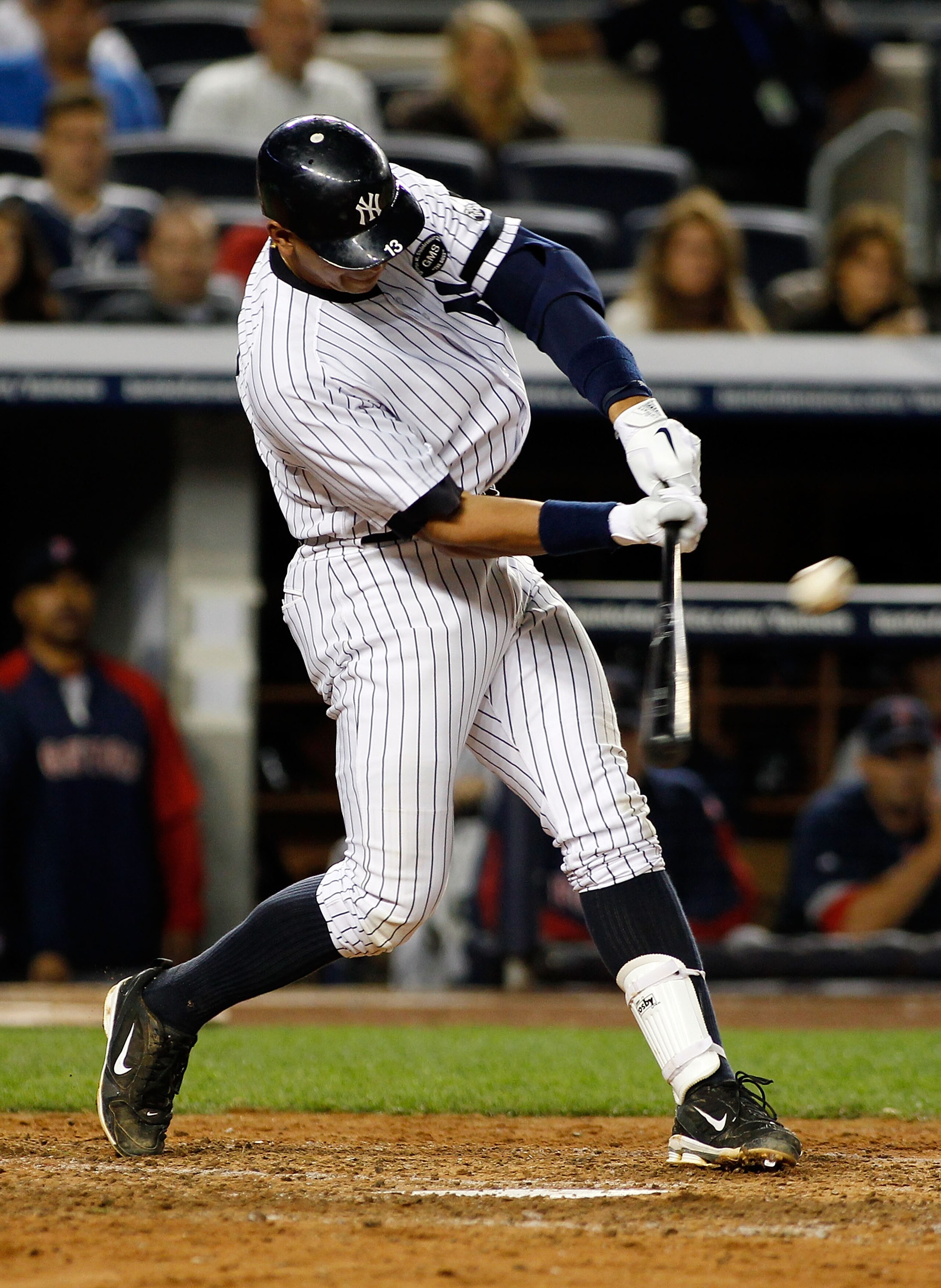 NEW YORK - SEPTEMBER 26: Alex Rodriguez #13 of the New York Yankees hits a two run homerun in the seventh-inning against the Boston Red Sox on September 26, 2010 at Yankee Stadium in the Bronx borough of New York City. (Photo by Mike Stobe/Getty Images) NEW YORK - SEPTEMBER 26: Alex Rodriguez #13 of the New York Yankees hits a two run homerun in the seventh-inning against the Boston Red Sox on September 26, 2010 at Yankee Stadium in the Bronx borough of New York City. (Photo by Mike Stobe/Getty Images)